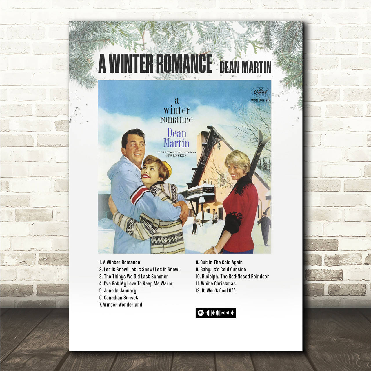 Entertainment 桌布 壁紙 — Vintage Dean Martin 專輯封面《A Winter Romance》裱框在白色磚牆上，搭配松樹枝。