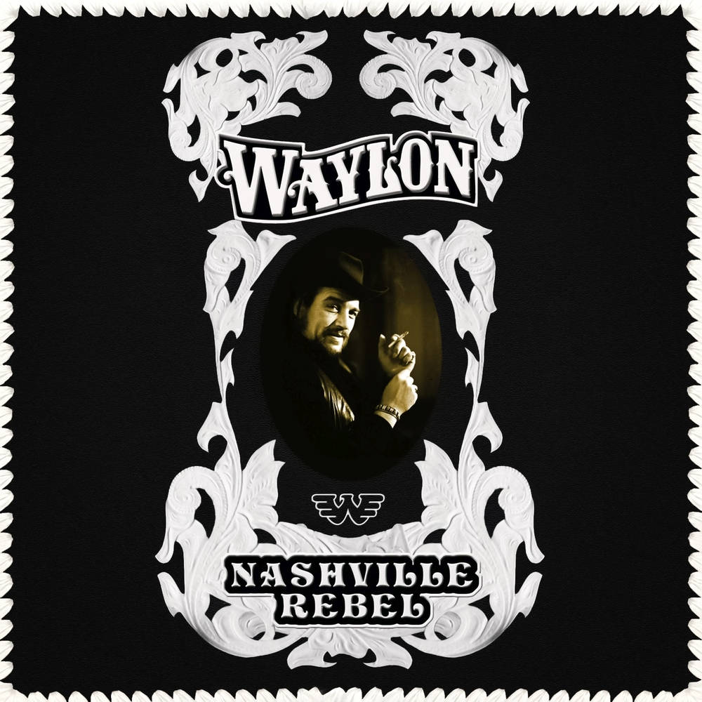album 桌布 壁紙 — Waylon Jennings 的復古風格肖像，以華麗的白色捲曲花紋鑲嵌在黑色背景上，並帶有 'Nashville Rebel' 文字。