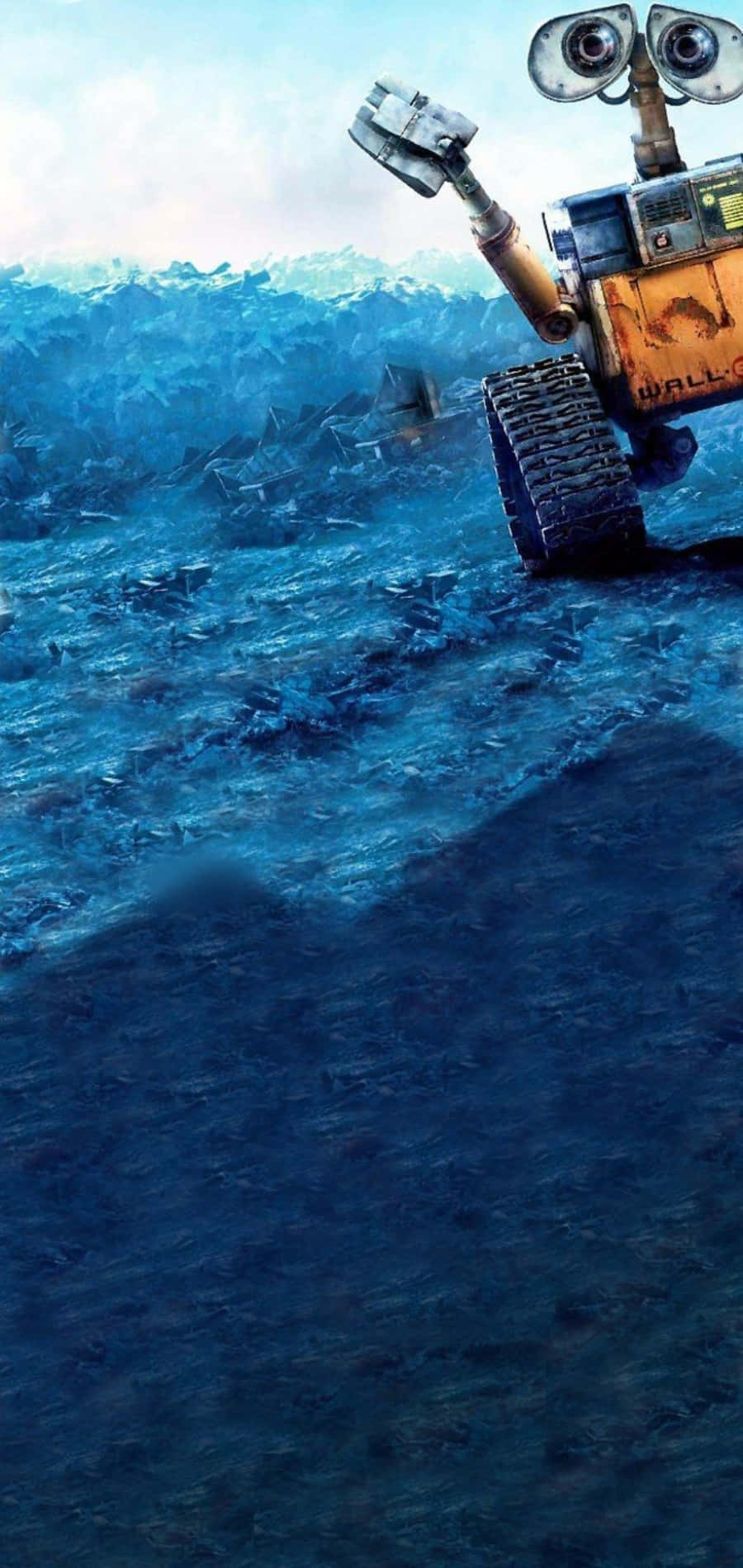 瓦力 桌布 壁紙 — Wall-E 獨自站在一個被垃圾覆蓋、天空朦朧的荒涼藍色星球上。
