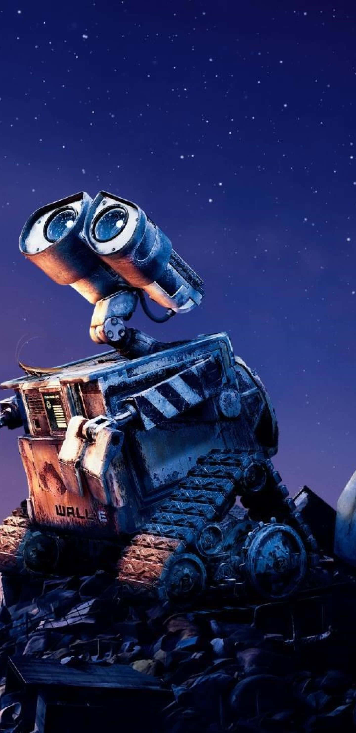機器人 桌布 壁紙 — WALL-E 獨自站在一堆垃圾上，在繁星點點的夜空下，他的雙筒望遠鏡眼睛帶著靜默的驚奇向上凝視。