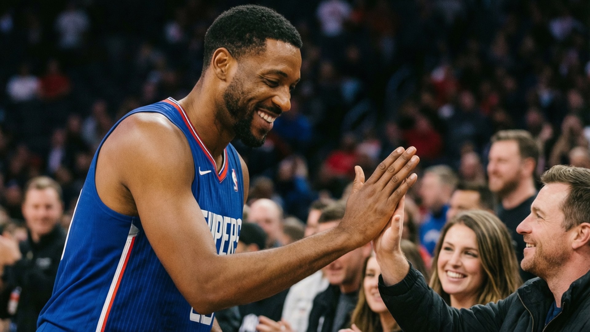 Fan Connection 壁紙 — 一位微笑的籃球運動員身穿藍色快艇隊球衣，在擁擠的場館中與球迷擊掌。