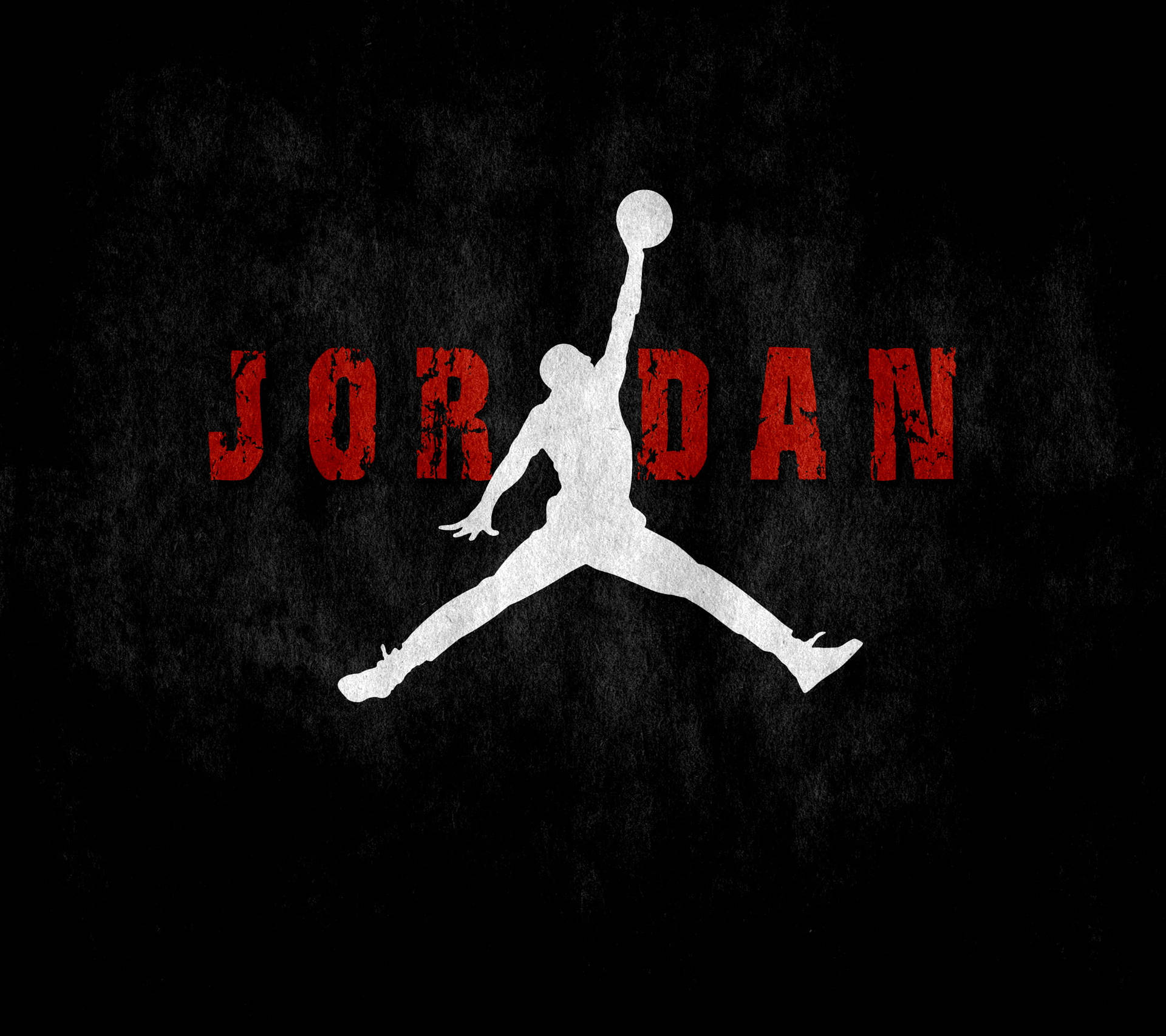 白色籃球運動員剪影跳起持球，位於黑色背景上的紅色「JORDAN」文字上方。 — Air Jordan 壁紙