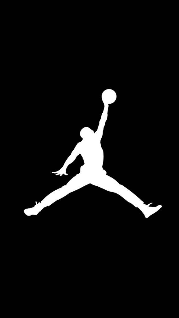 白色剪影，一個籃球運動員在黑色背景上跳起灌籃。 — Jordan Logo 壁紙