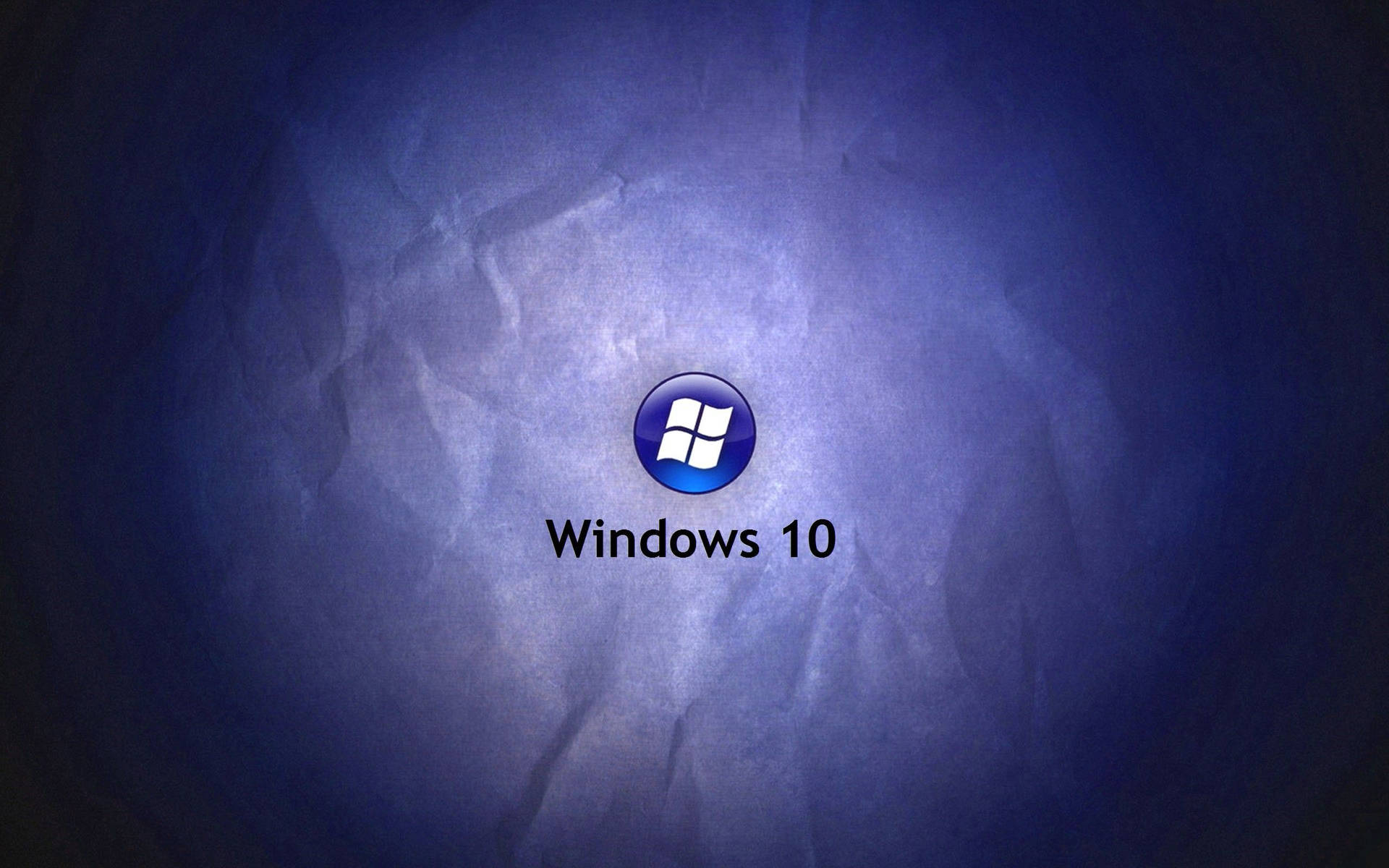 Windows 10 標誌在帶紋理的藍色背景上 — Windows 11 壁紙