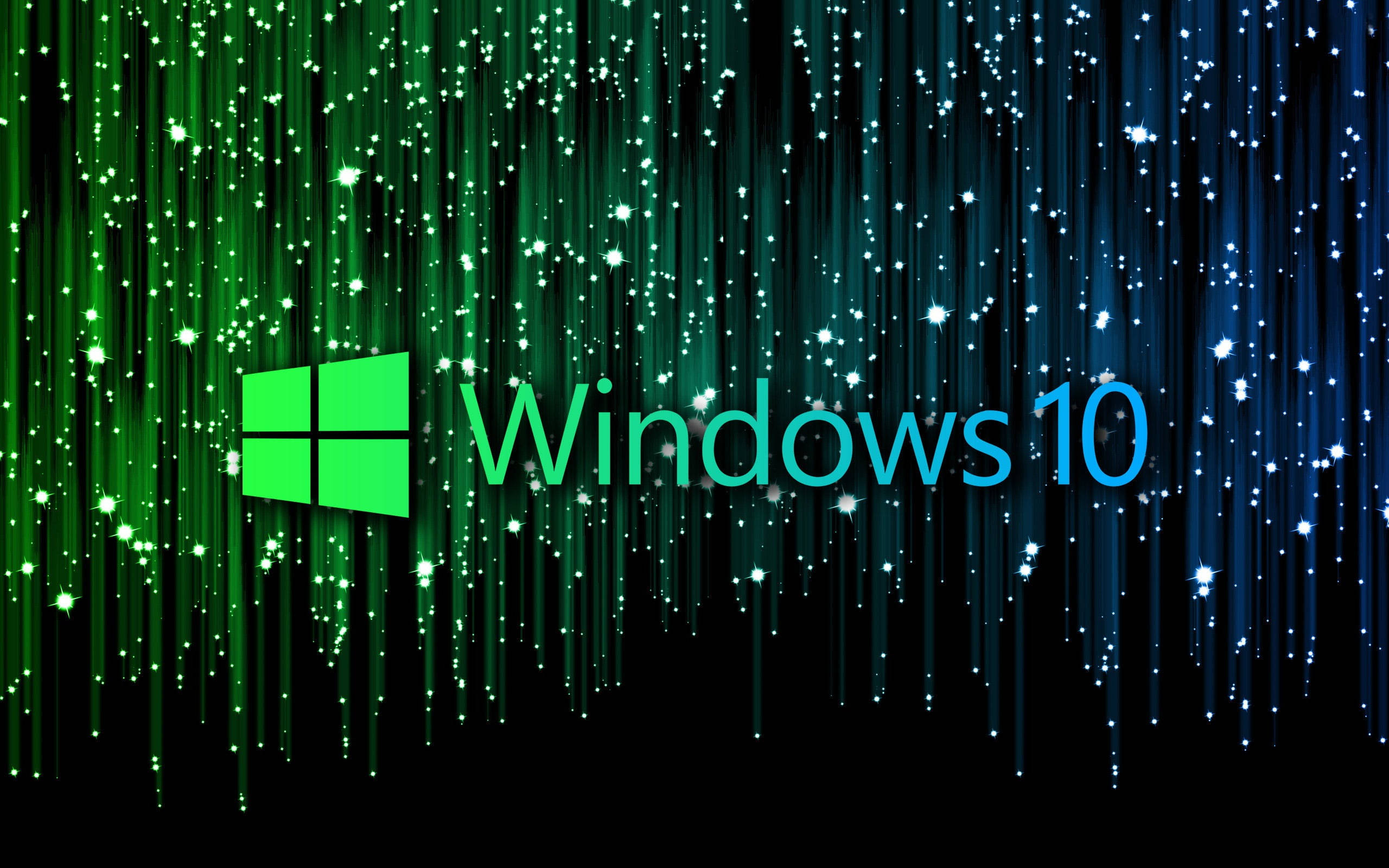 主題 桌布 壁紙 — Windows 10 標誌在深色背景上發光，帶有層疊的綠色和藍色光條，點綴著閃爍的粒子。