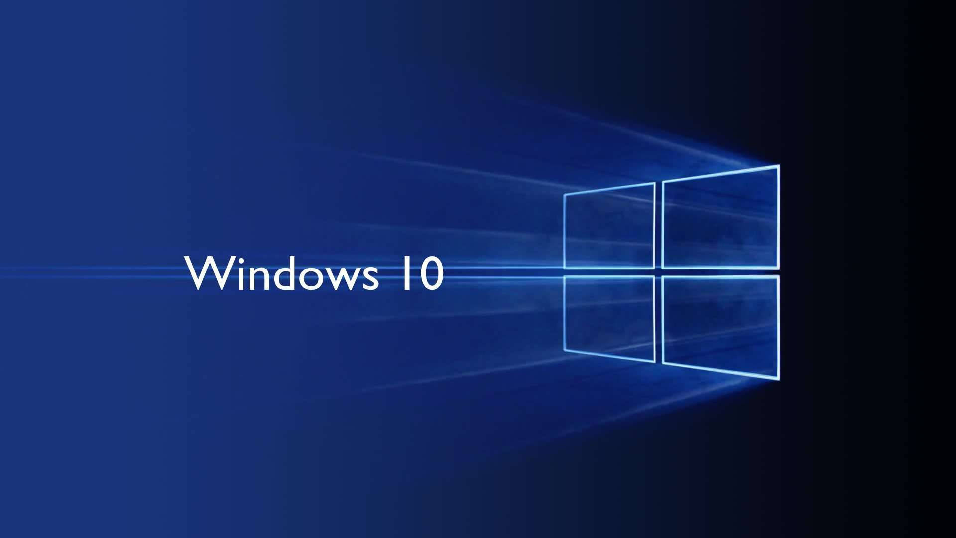 Windows 10 高畫質 桌布 壁紙 — Windows 10 標誌在深藍色漸變背景上發出藍色光芒。
