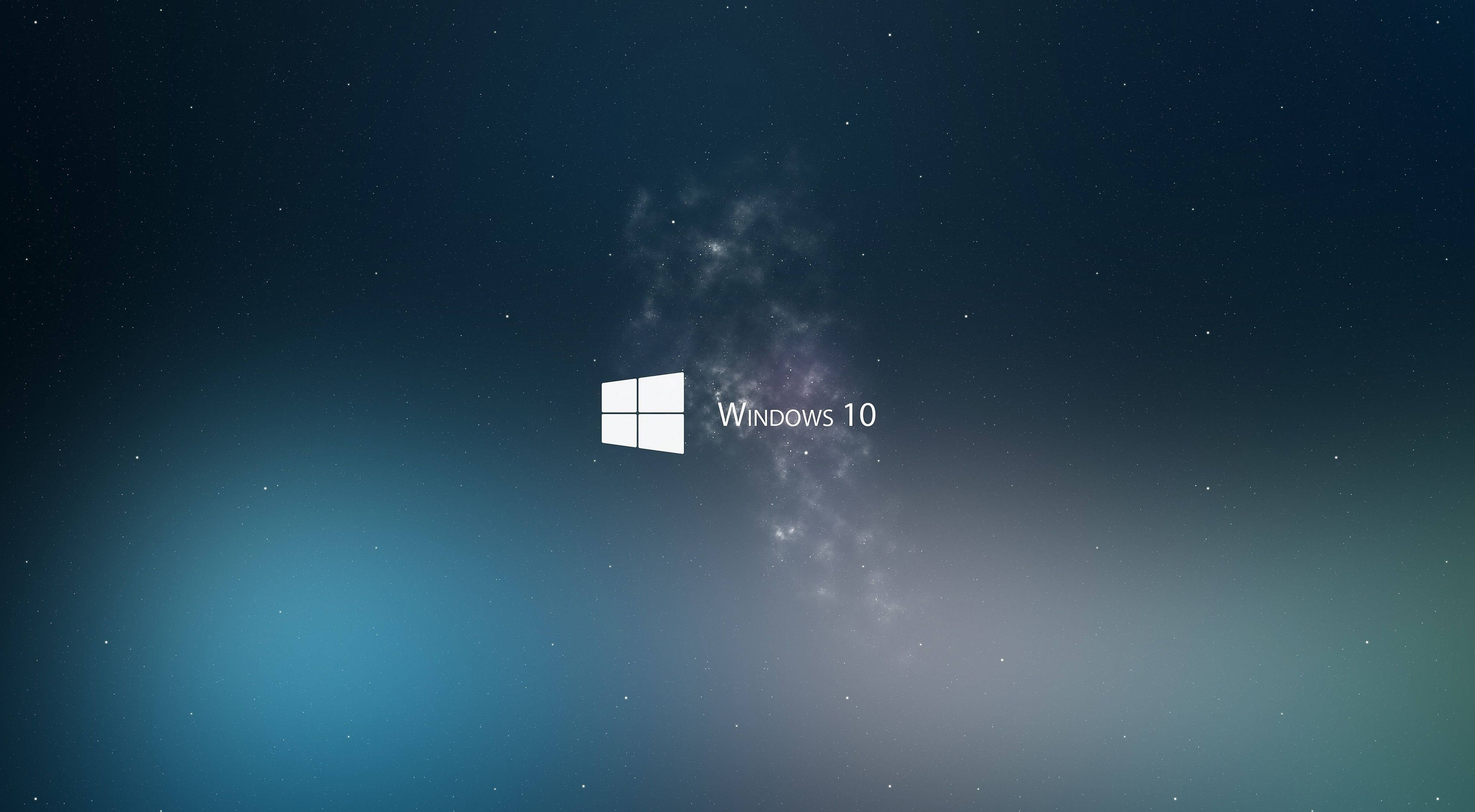 乾淨 4K 桌布 壁紙 — Windows 10 標誌居中，背景為星空宇宙，帶有藍色和紫色漸層。
