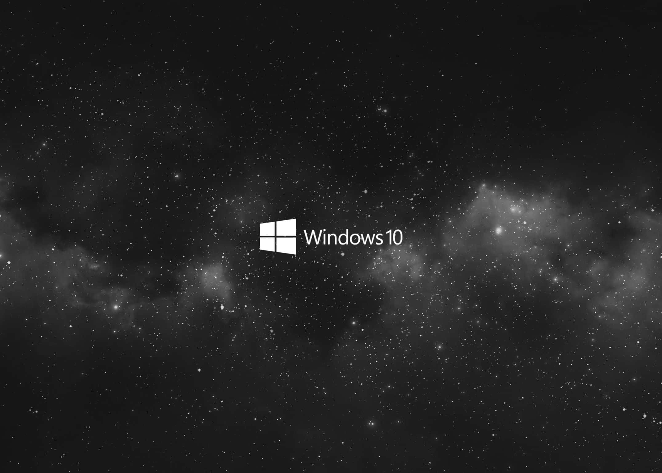 2152x1536 桌布 壁紙 — Windows 10 標誌居中對齊，背景為星空宇宙，帶有星雲和散落的星星。