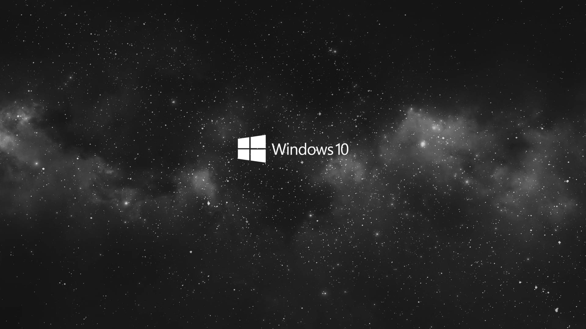 Windows 10 標誌在星空宇宙背景上 — 4K筆電壁紙 壁紙