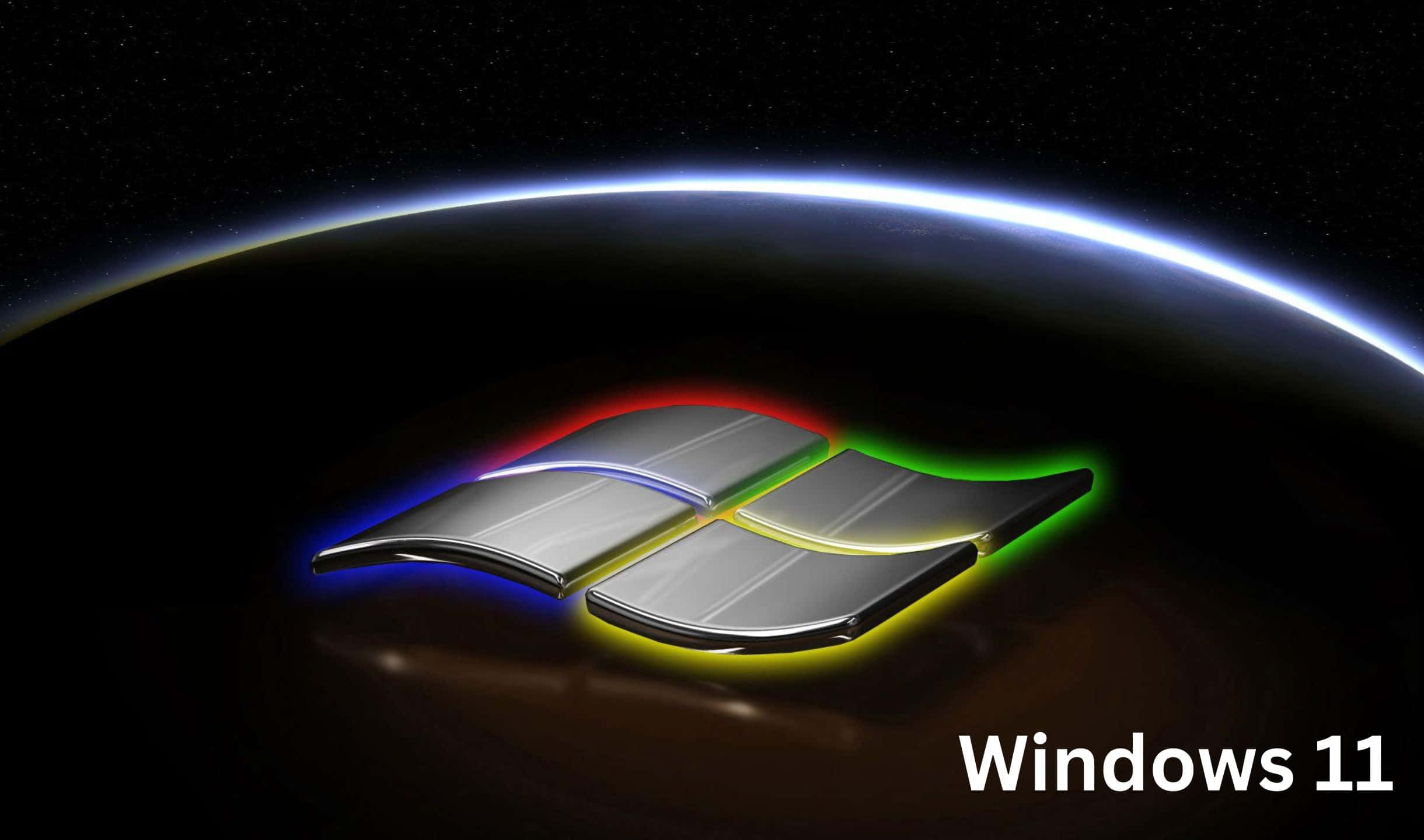 Windows 11 桌布 壁紙 — Windows 11 標誌在太空中地球彎曲的地平線襯托下發出彩虹光芒。