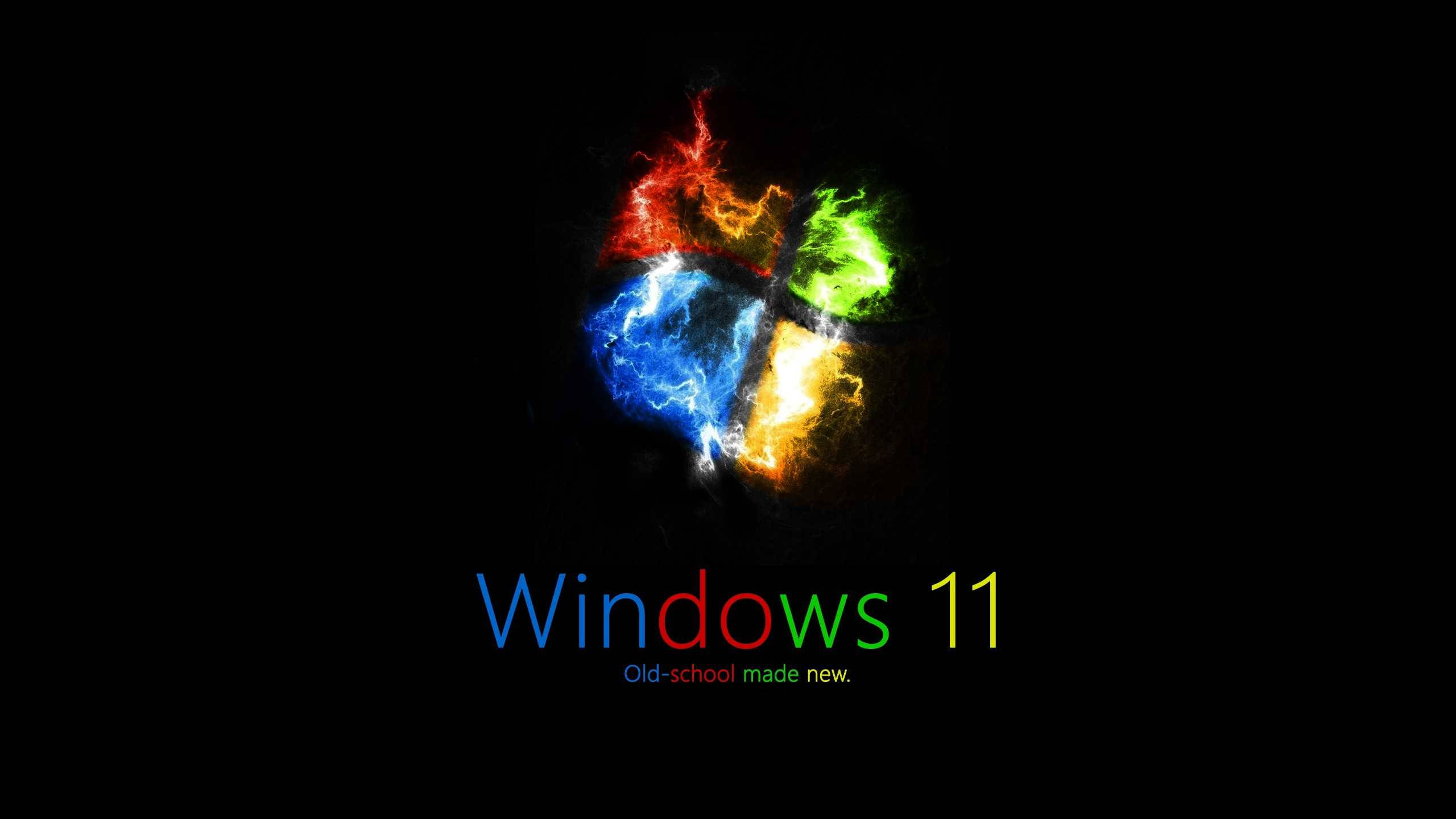 Windows 11 4K 桌布 壁紙 — Windows 11 標誌在黑色背景上迸發出火紅、綠、藍、黃的能量，下方有標語。