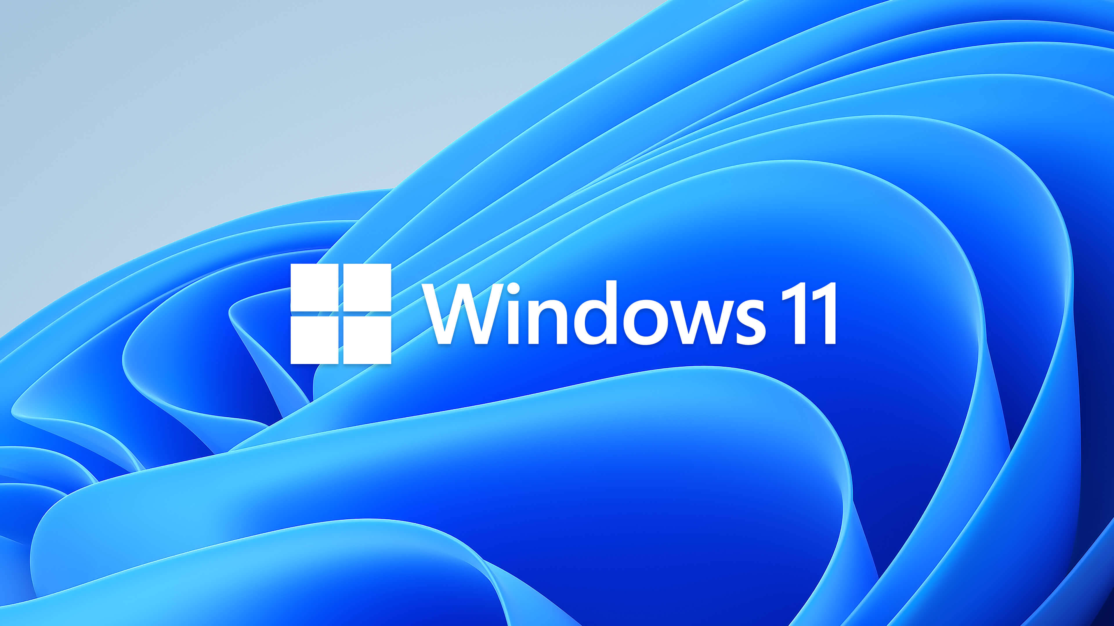 Windows 11 桌布 壁紙 — Windows 11 標誌居中於動態藍色波浪背景上，帶有柔和漸變。