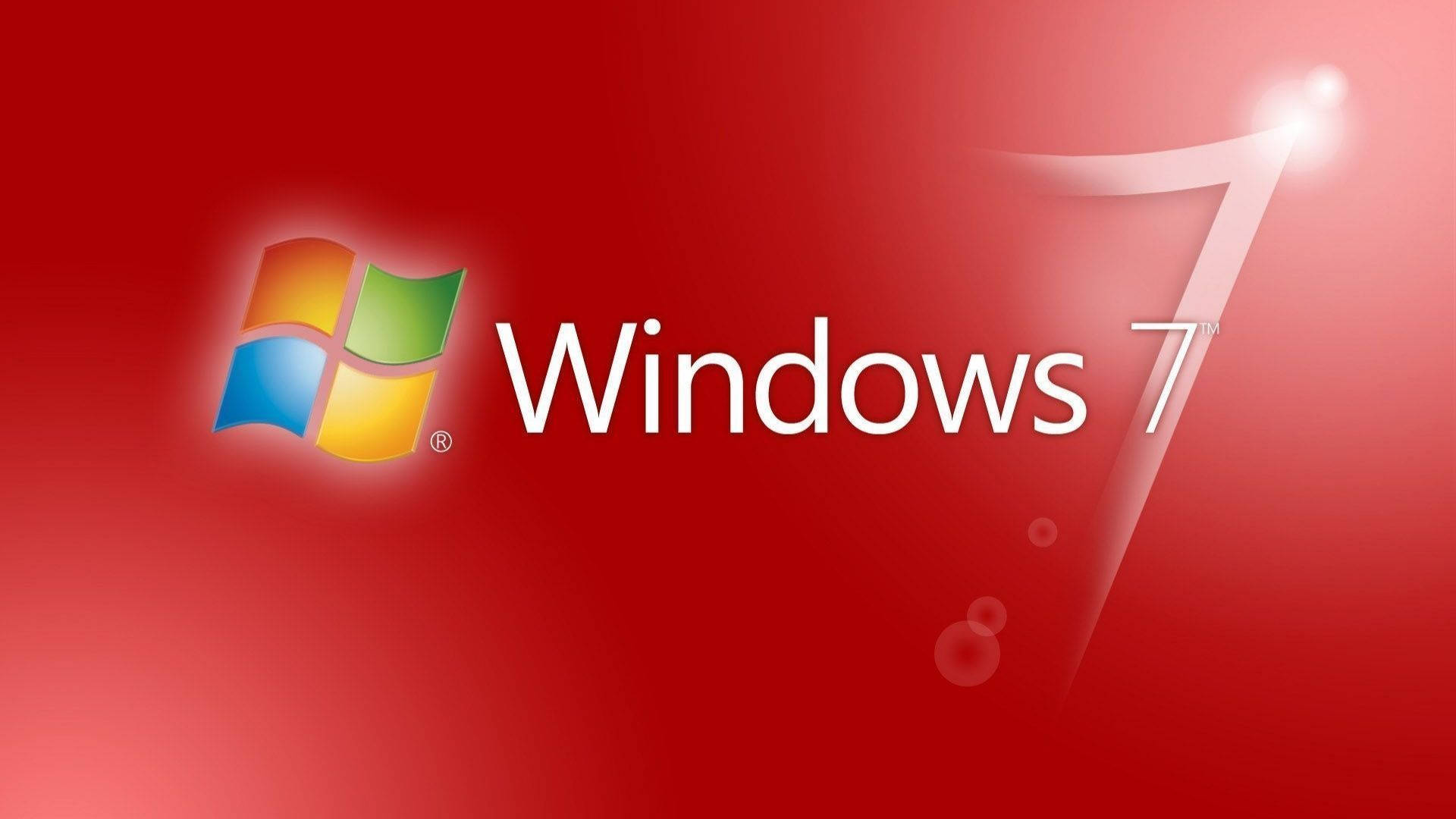 Windows 7 桌布 壁紙 — Windows 7 標誌，帶有彩色四窗格圖示和發光白色文字，背景為鮮豔的紅色漸變。