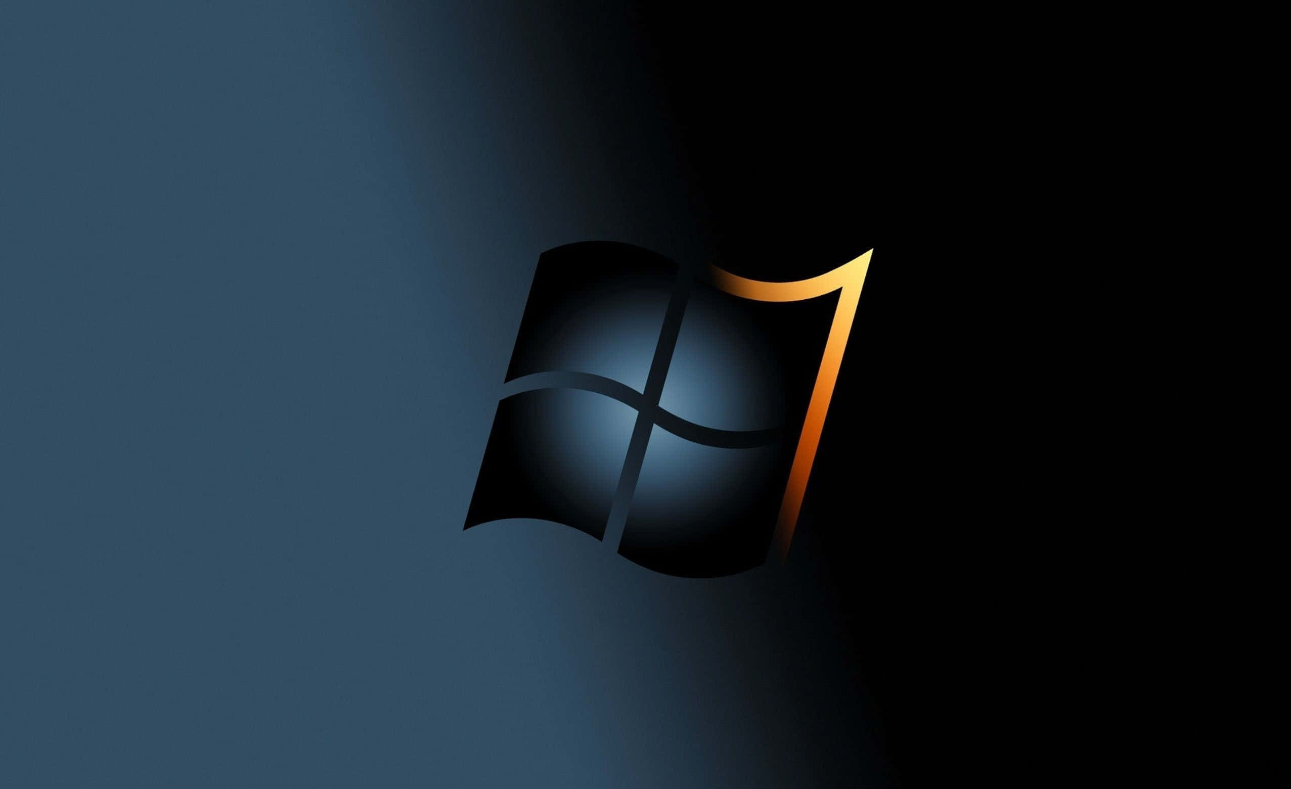 Windows 7 桌布 壁紙 — Windows 7 標誌在深藍色漸層背景上發出金色邊緣的光芒。