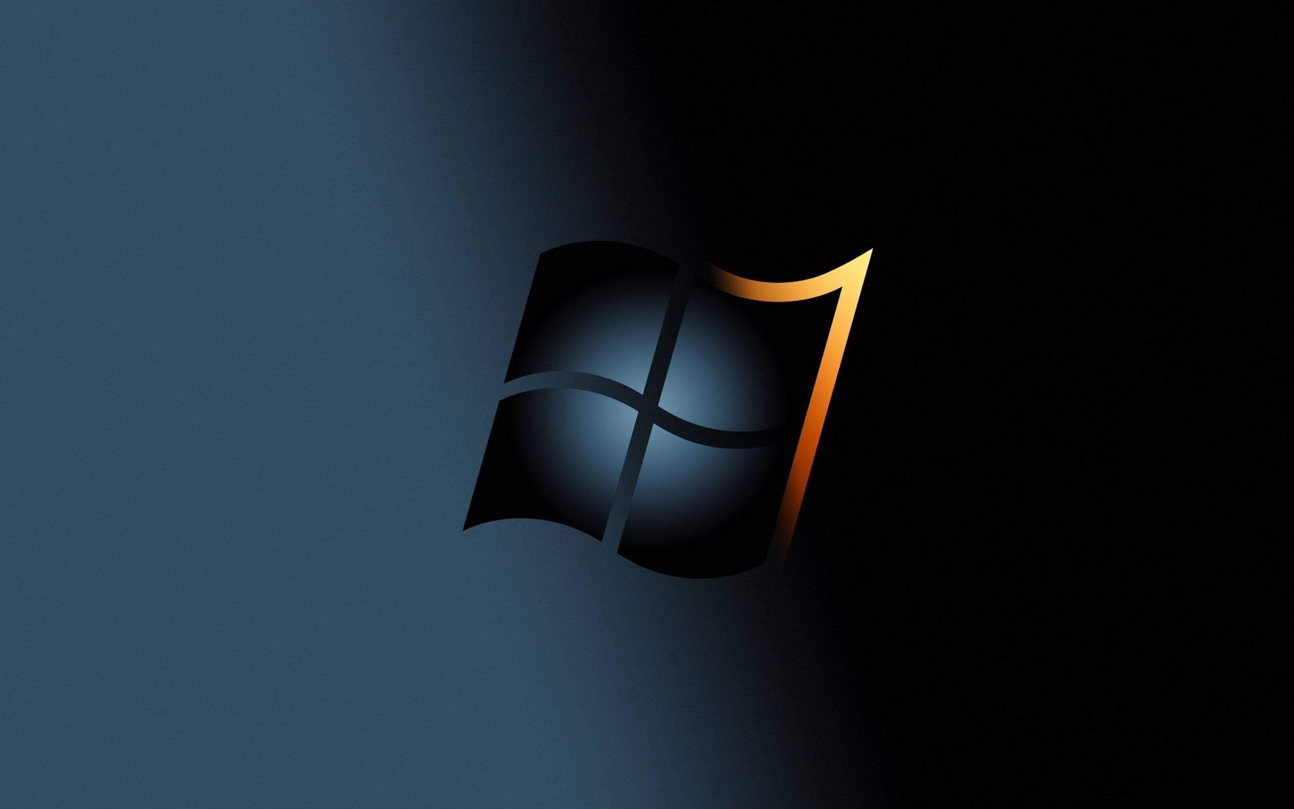 black windows 10 HD 桌布 壁紙 — Windows 7 標誌在深藍色漸變背景上閃耀著金色邊緣。