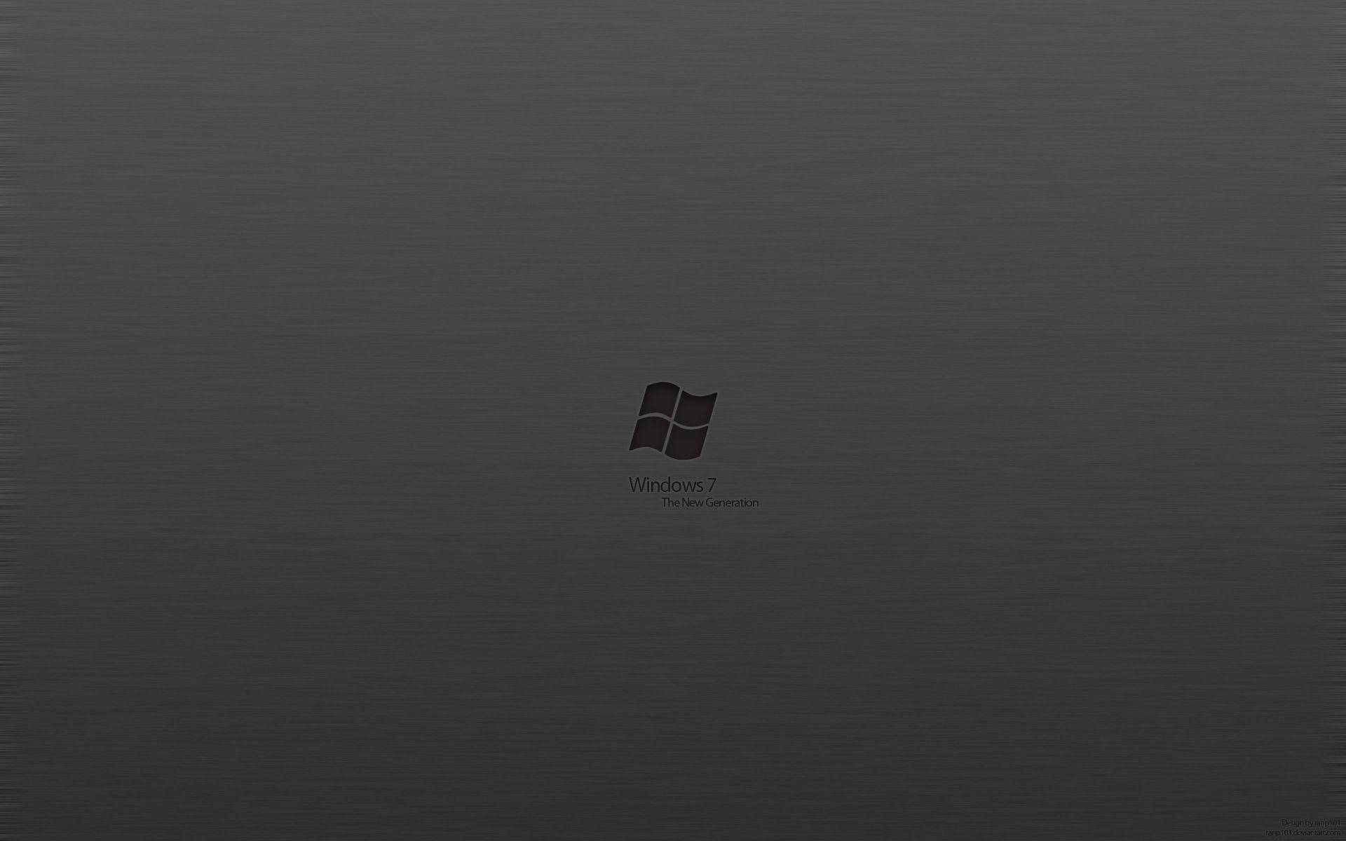 Dark Windows 桌布 壁紙 — Windows 7 標誌居中顯示在帶有細微紋理的深灰色拉絲金屬背景上。