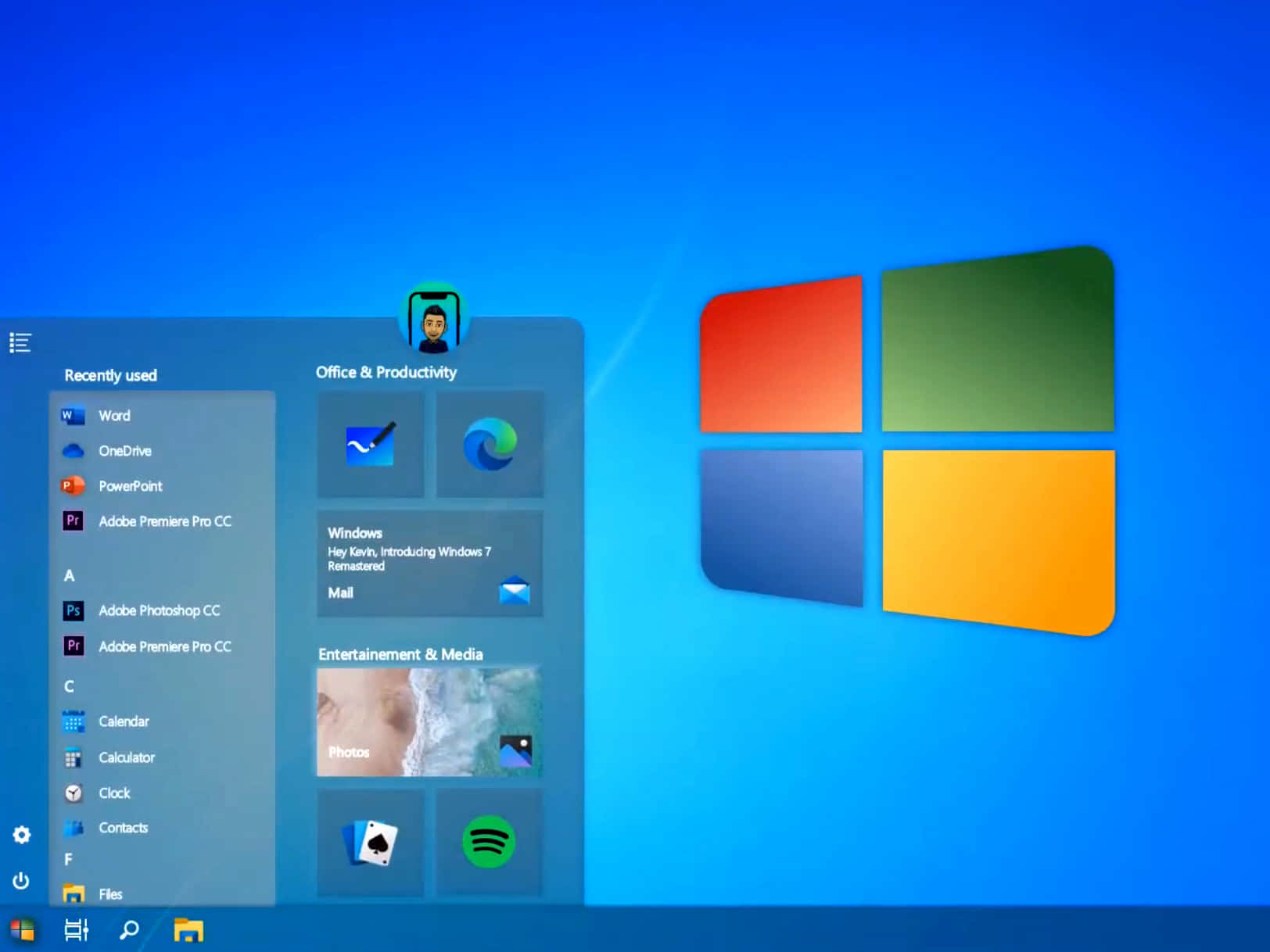 Windows 7 桌布 壁紙 — Windows 7 開始功能表介面，帶有彩色圖塊和使用者個人檔案，背景為鮮豔的藍色桌面。