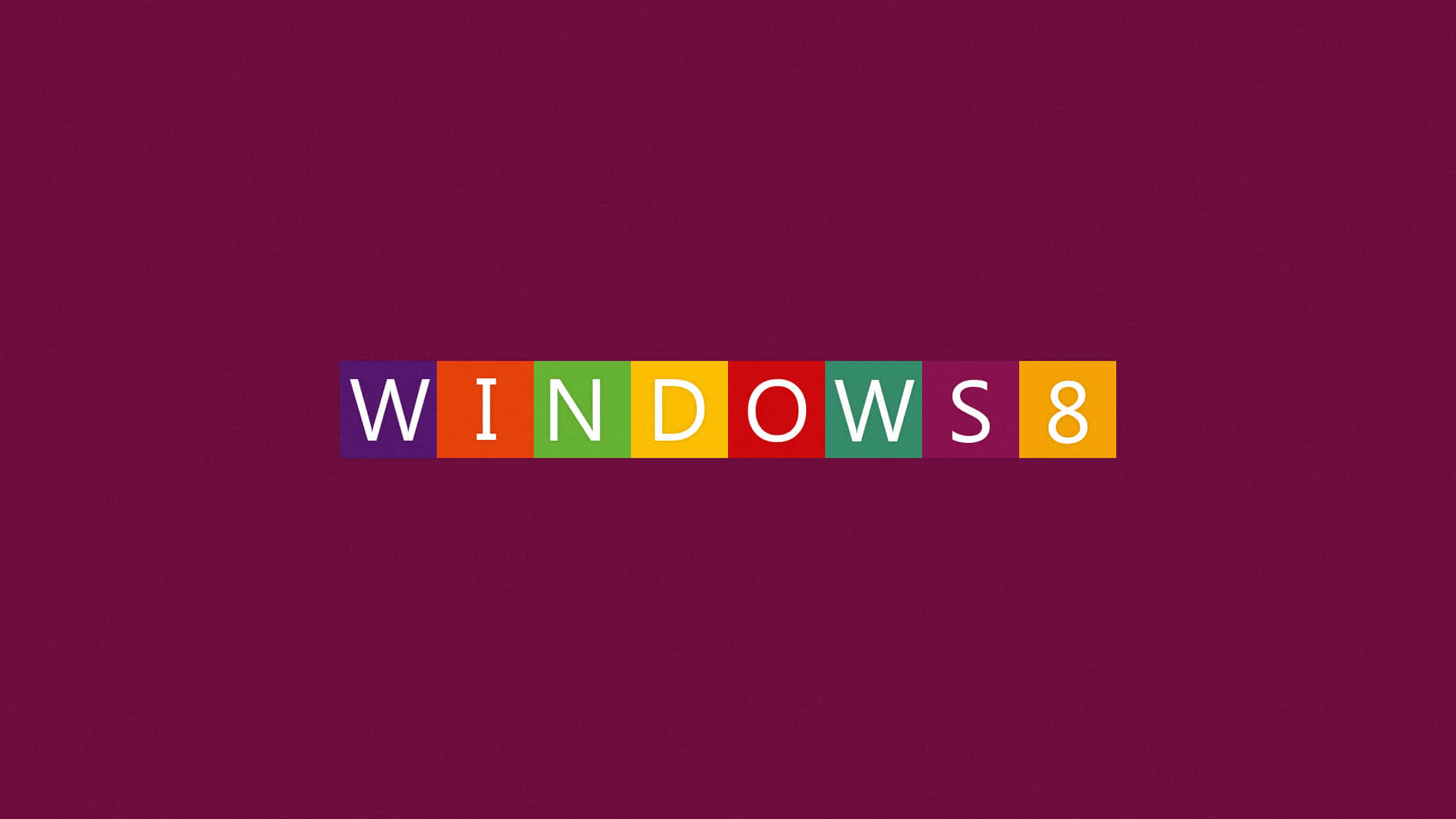Windows 8 桌布 壁紙 — Windows 8 標誌以彩色方塊居中顯示在純洋紅色背景上。