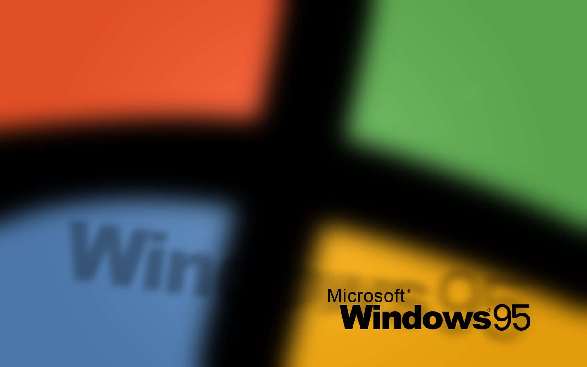 Windows 95 動態圖 桌布 壁紙 — Windows 95 標誌的模糊特寫，帶有四個彩色方塊和部分文字。