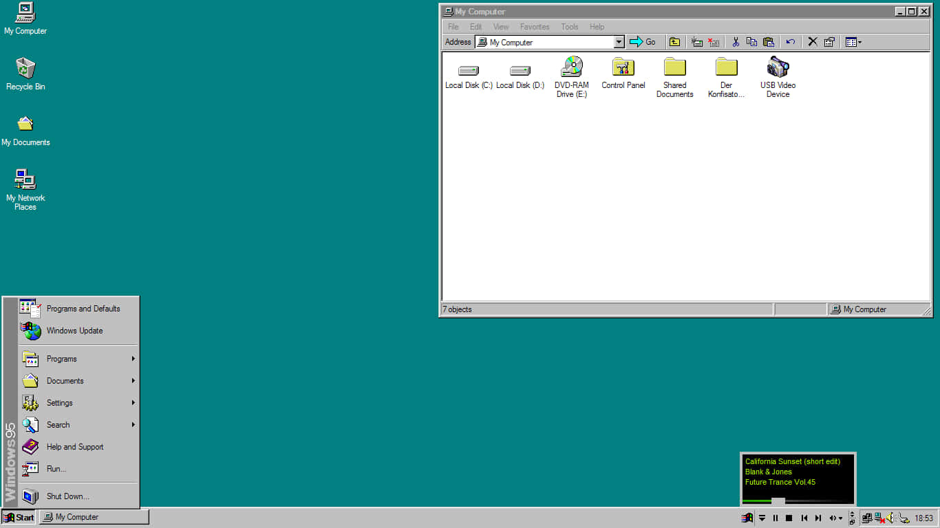 Windows 95 動態圖 桌布 壁紙 — Windows 98 桌面，帶有青綠色背景，顯示我的電腦視窗和開始功能表已開啟。
