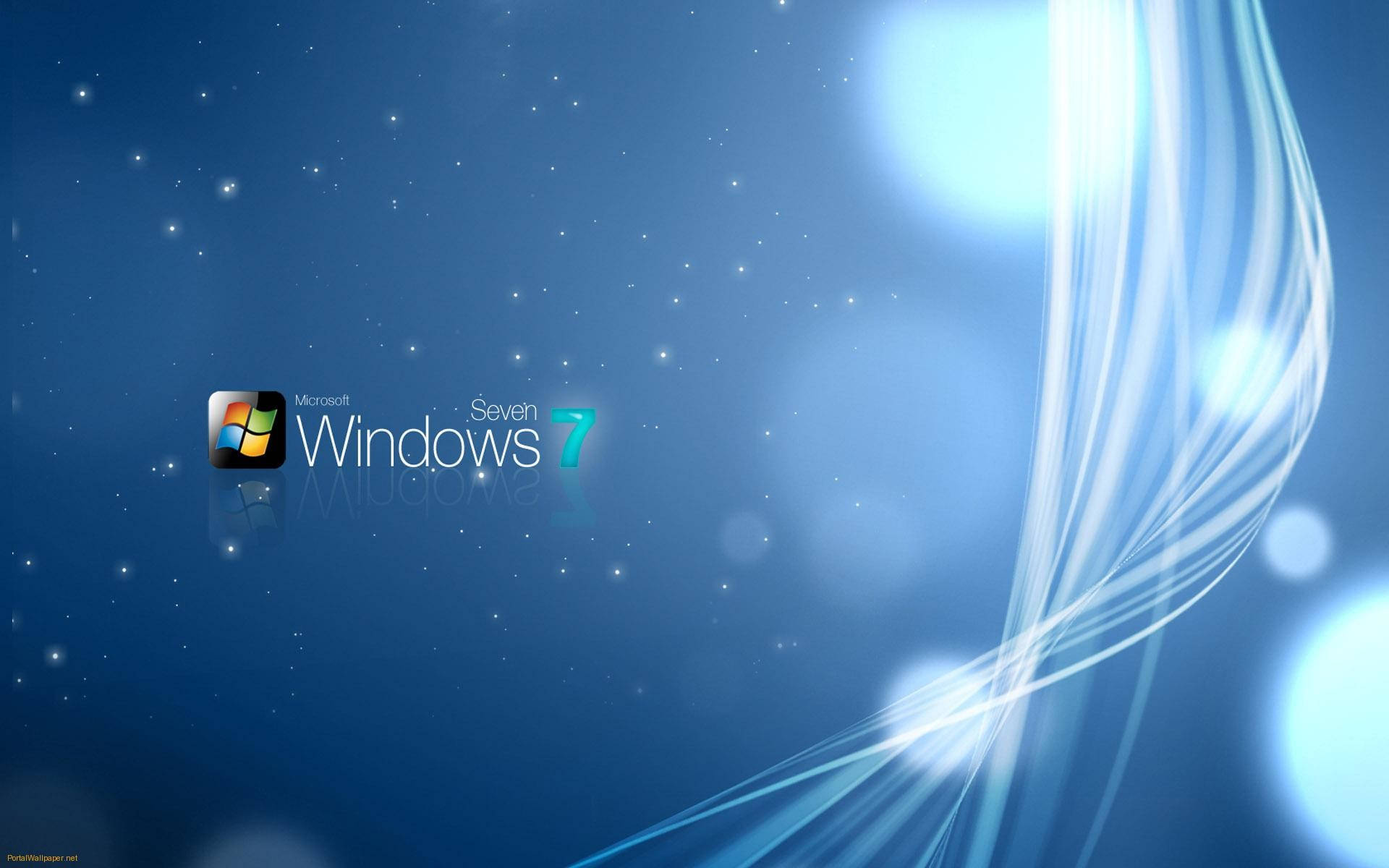 微軟桌面 桌布 壁紙 — Windows Seven 標誌在深藍色宇宙背景中發光，伴隨著流動的光跡和星狀斑點。
