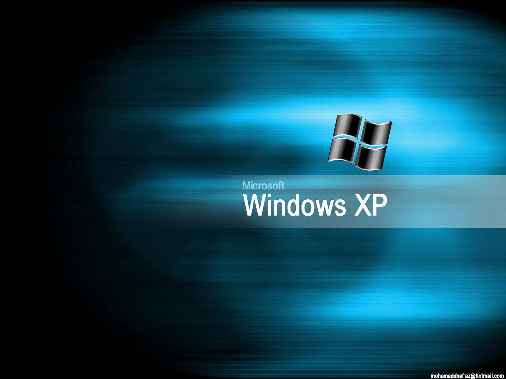 Xp 桌布 壁紙 — Windows XP 標誌居中於帶有暗邊的動態藍色漸變背景上。