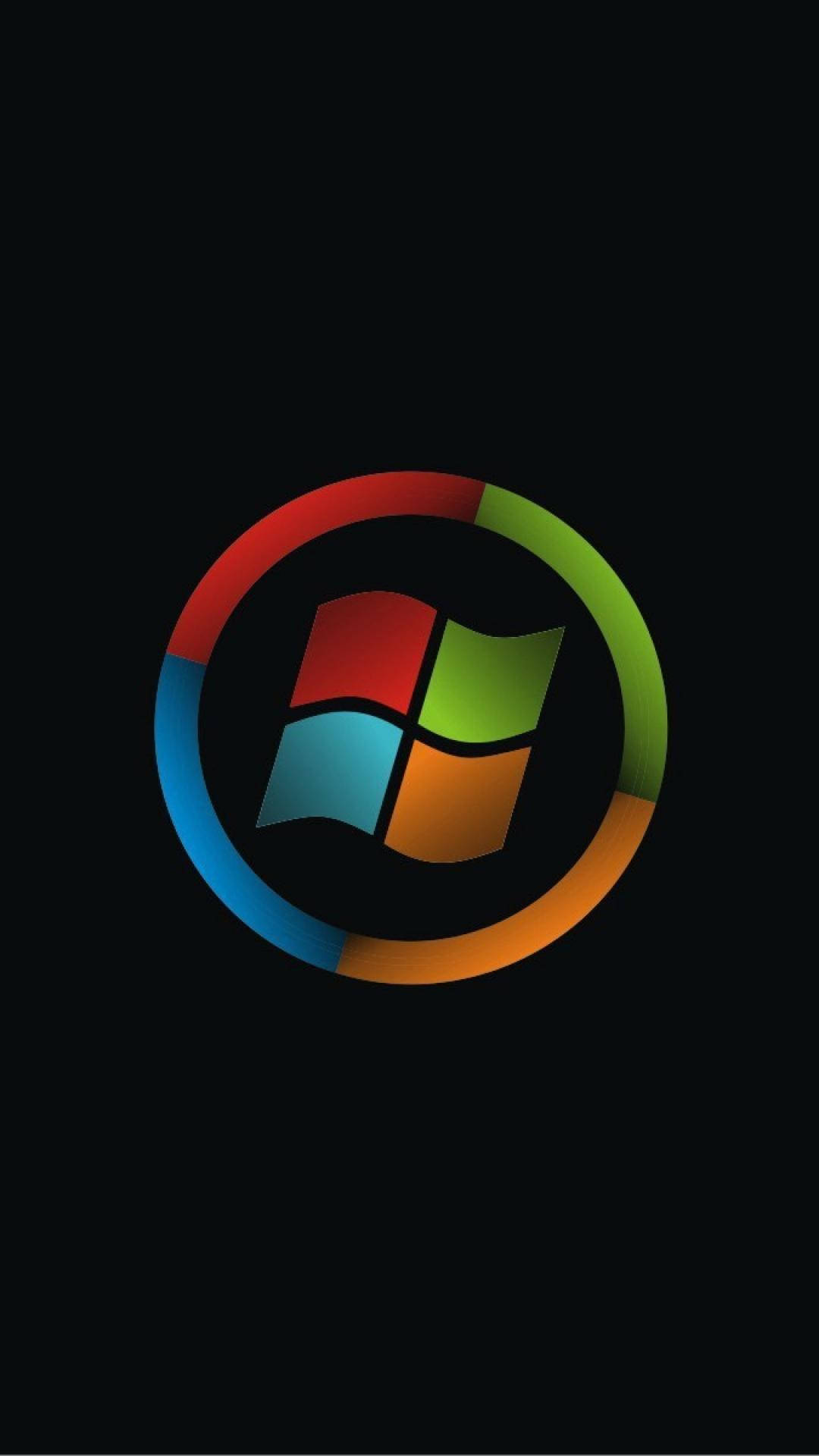 Windows 11 桌布 壁紙 — Windows 標誌，黑色背景上帶有彩色分段圓圈。