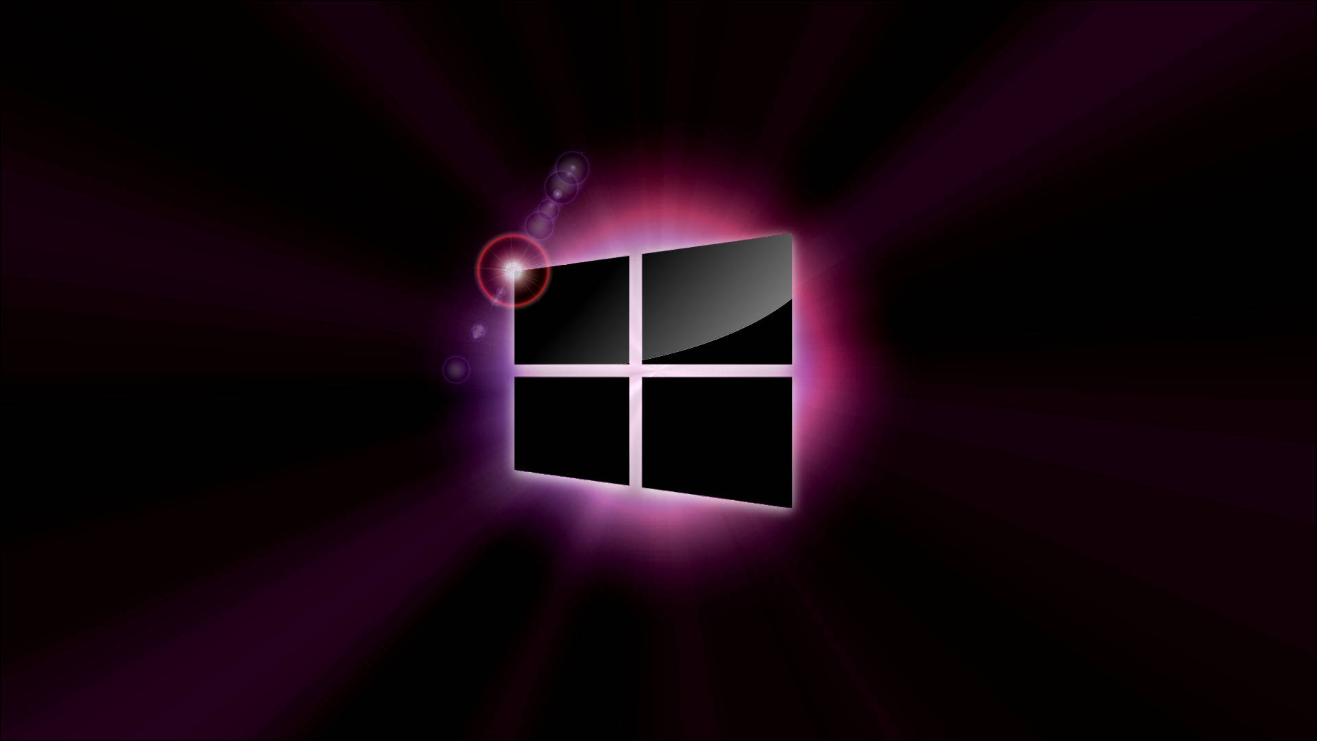 Laptop Desktop 桌布 壁紙 — Windows 標誌在黑暗背景上散發出耀眼的紫色光芒，並帶有鏡頭光暈效果。