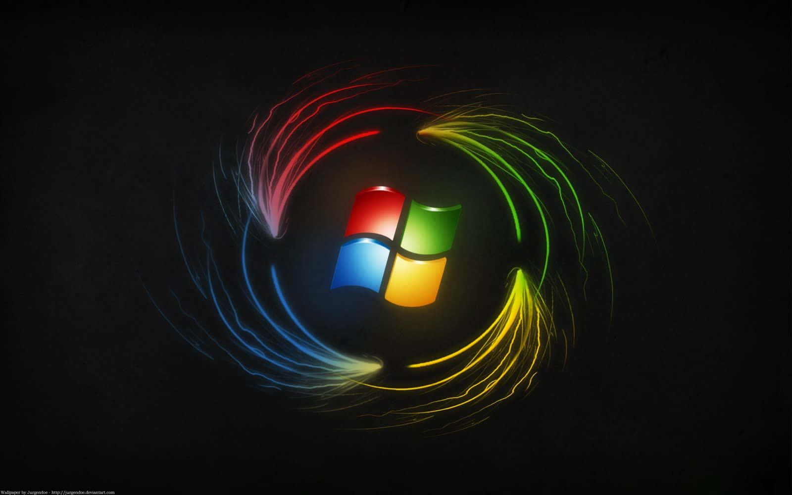 Cool Windows Desktop 桌布 壁紙 — Windows 標誌在黑色背景上發光，帶有旋轉的紅色、綠色、藍色和黃色光跡。