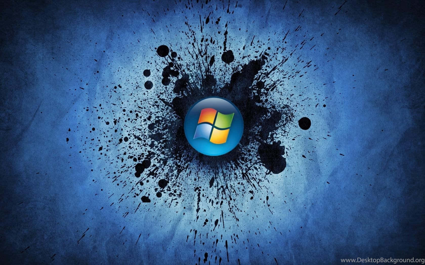 Cool Windows Desktop 桌布 壁紙 — Windows 標誌居中位於帶紋理的藍色背景上的黑色墨水飛濺中。