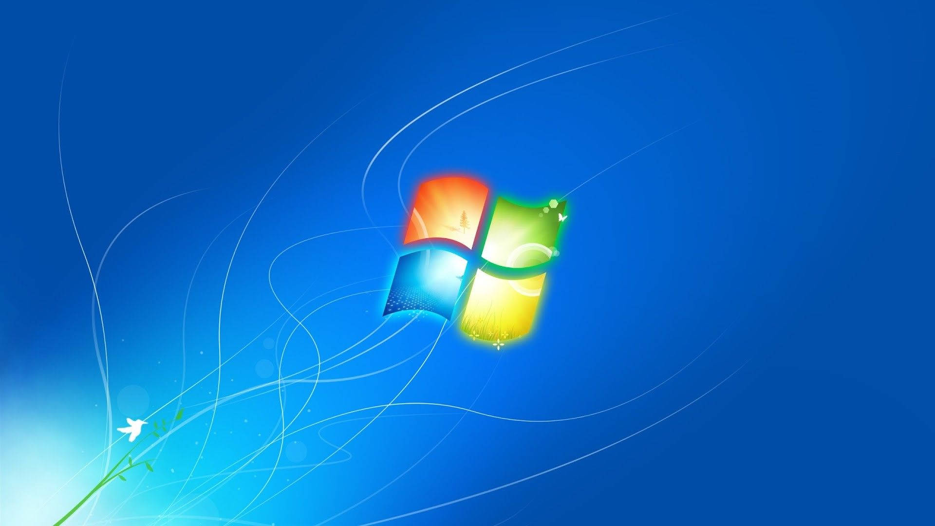 Windows 7 桌布 壁紙 — Windows 標誌發光，帶有紅色、綠色、藍色和黃色面板，背景為漸變藍色，帶有白色漩渦和一朵小花。
