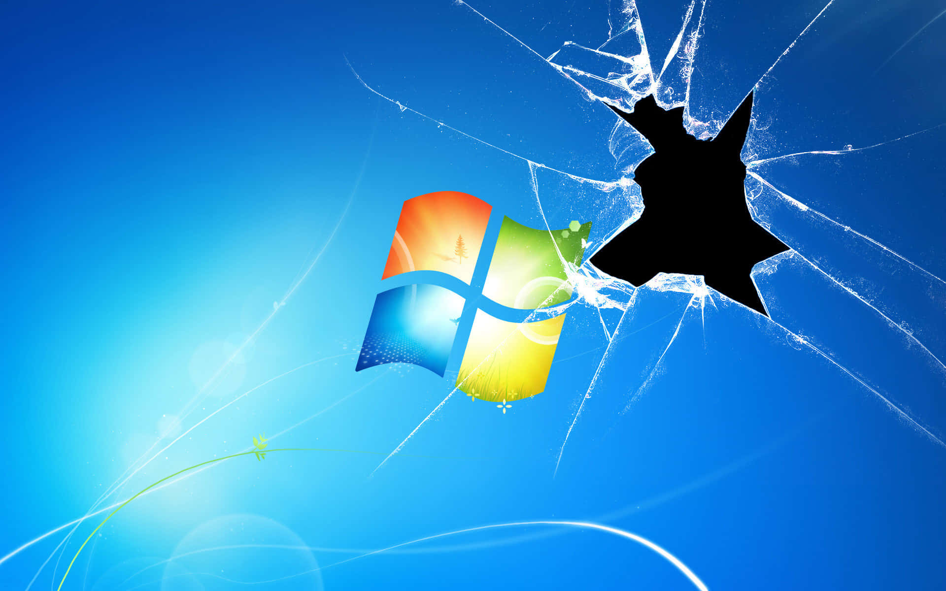 裂屏 桌布 壁紙 — Windows 標誌透過破碎玻璃效果在充滿活力的藍色漸變背景上閃耀。