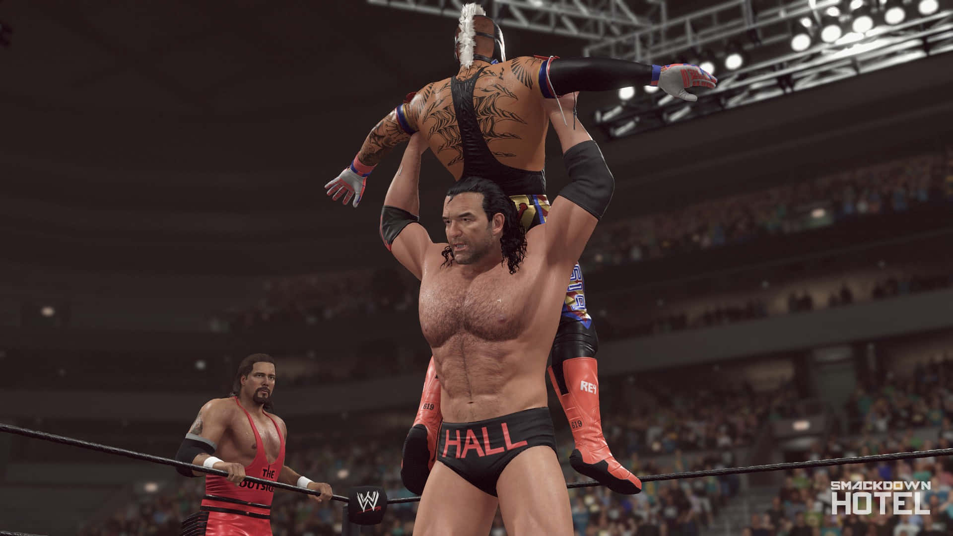電玩遊戲 桌布 壁紙 — Wrestler Hall 在 WWE SmackDown Hotel 比賽中，於座無虛席的場館內將對手高舉過頭。