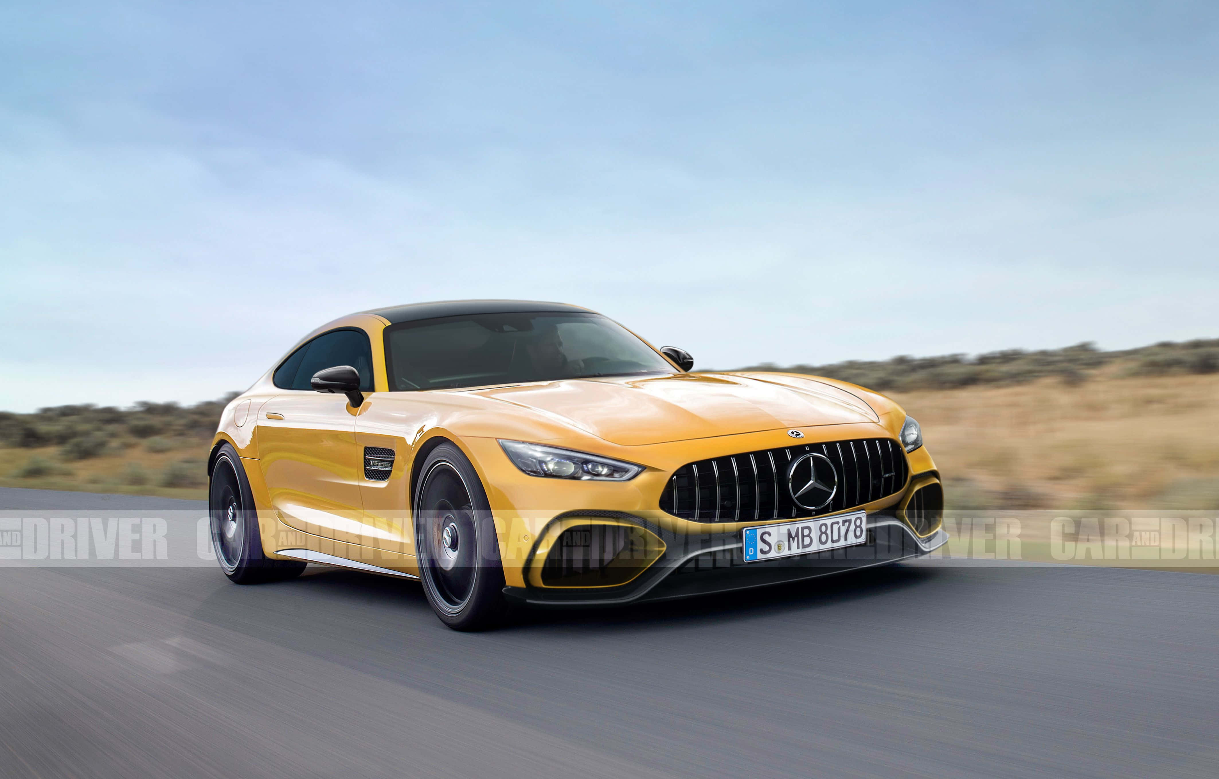 Mercedes Benz Amg Gt 桌布 壁紙 — 一輛充滿活力的黃色 Mercedes-AMG GT R 在晴朗藍天下沿沙漠道路飛馳。