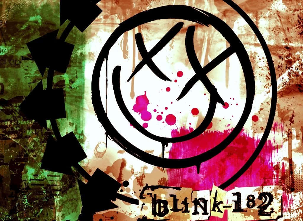  壁紙 — 一個粗糙塗鴉風格的 Blink-182 標誌，帶有被劃掉的微笑臉和粉紅色潑濺，背景為有紋理的綠色和棕色。