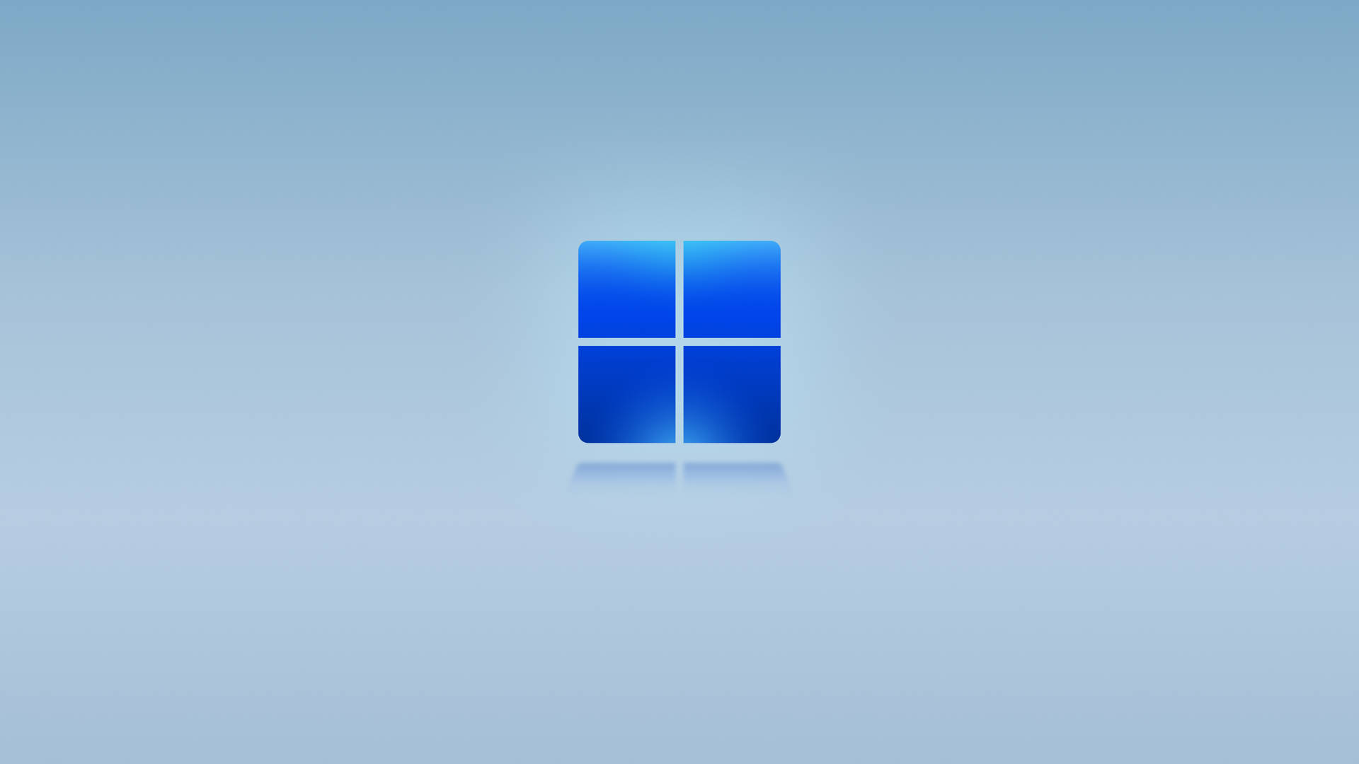 帶有藍色漸變背景和反射的Windows標誌 — Windows 11 壁紙