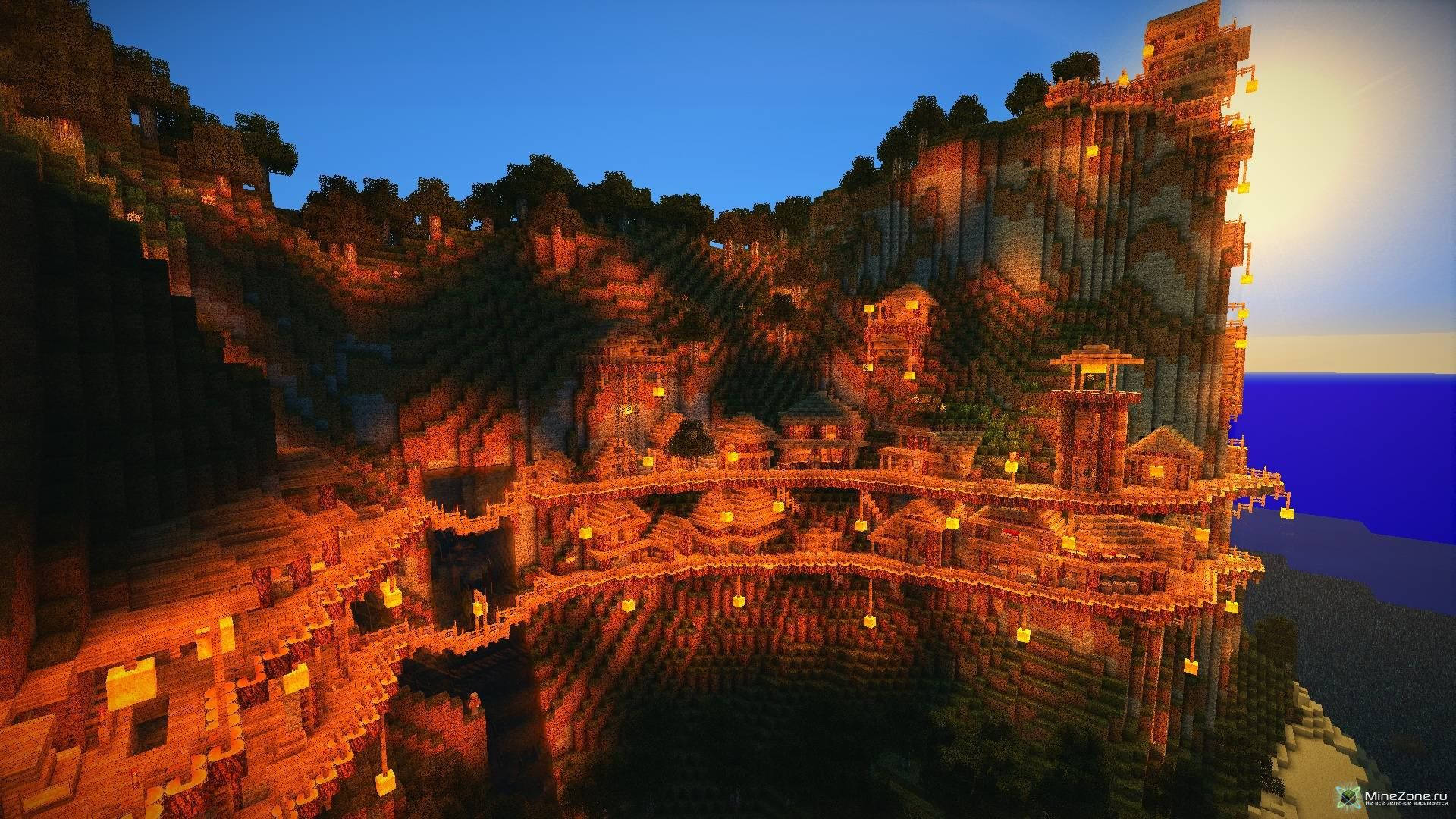 日落時被燈籠照亮的Minecraft懸崖村莊，俯瞰海洋 — 我的世界 高畫質壁紙 壁紙