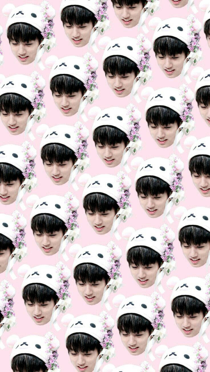 一個圖案，年輕男子戴著兔帽和花朵在粉紅色背景上。 — Bts 壁紙