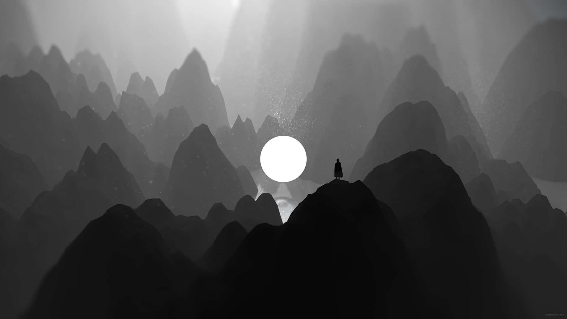  壁紙 — 一個孤獨的身影站在山頂上，在霧氣瀰漫的黑白山脈中，剪影映襯著一個發光的球體。