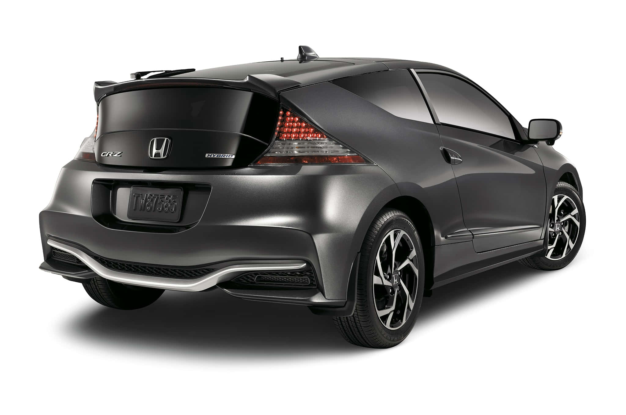 Honda Cr-z 桌布 壁紙 — 一輛流線型消光灰色本田CR-Z雙門跑車，從後方四分之三角度拍攝，背景為純白色。