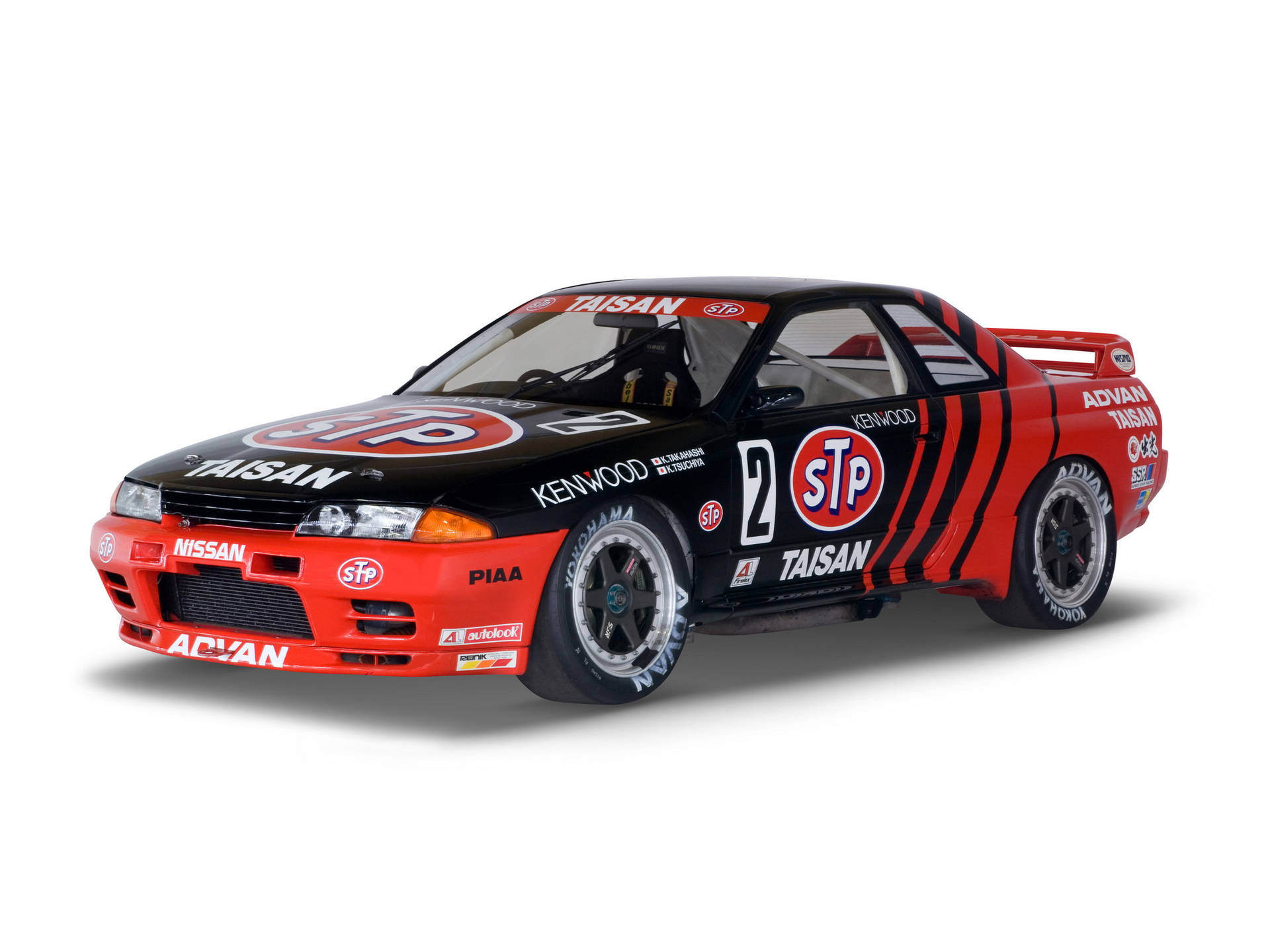 帶有STP和Taikan標誌的紅色和黑色日產Skyline GT-R賽車。 — 城市天際線汽車 壁紙