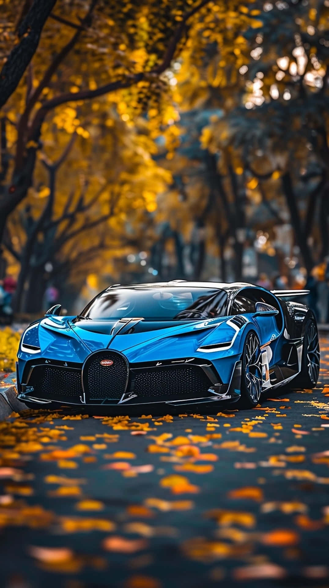 Bugatti Bolide 桌布 壁紙 — 一輛引人注目的藍色Bugatti超跑停在一條鋪滿落葉的道路上，上方是金黃色的秋樹。