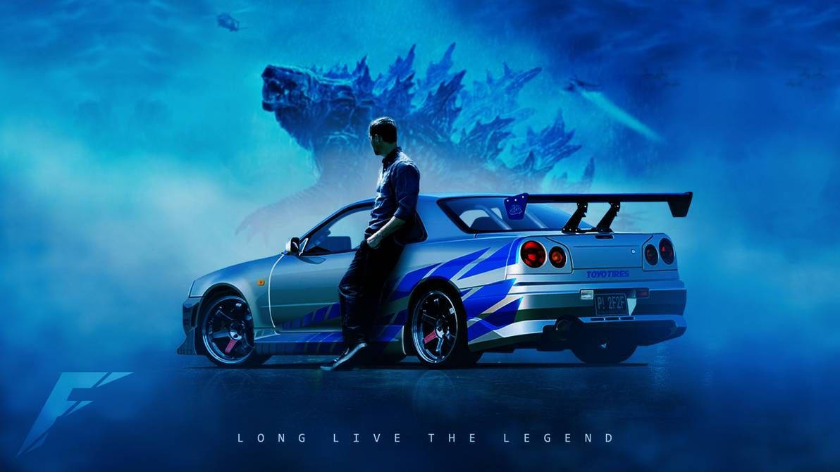 男子靠在日產Skyline GT-R上，身後哥吉拉從藍色水中升起。 — 保羅·沃克汽車 壁紙