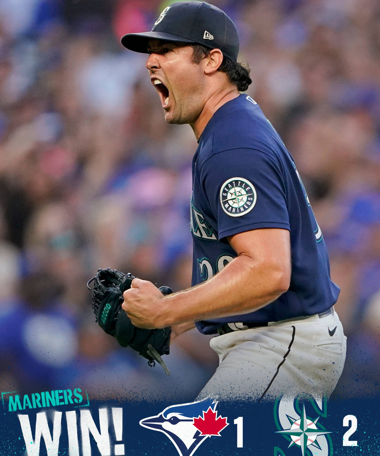 棒球選手慶祝水手隊以2比1擊敗藍鳥隊。 — MLB 壁紙