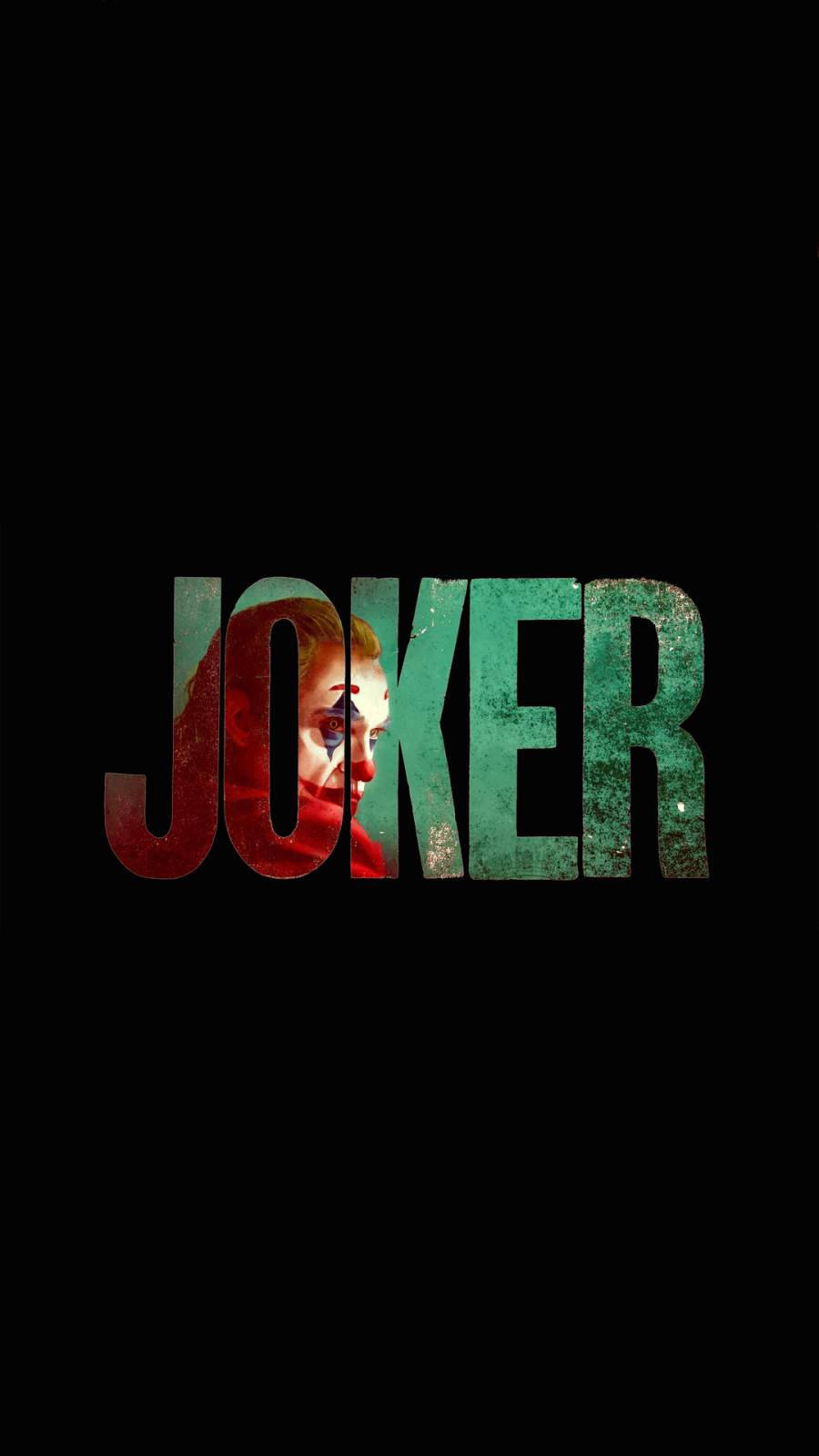 《Joker》電影海報，標題字母揭示一個化了小丑妝的蒼白面孔。 — 小丑 壁紙