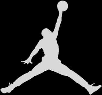 黑色背景上籃球運動員灌籃的白色剪影。 — Jordan Logo 壁紙