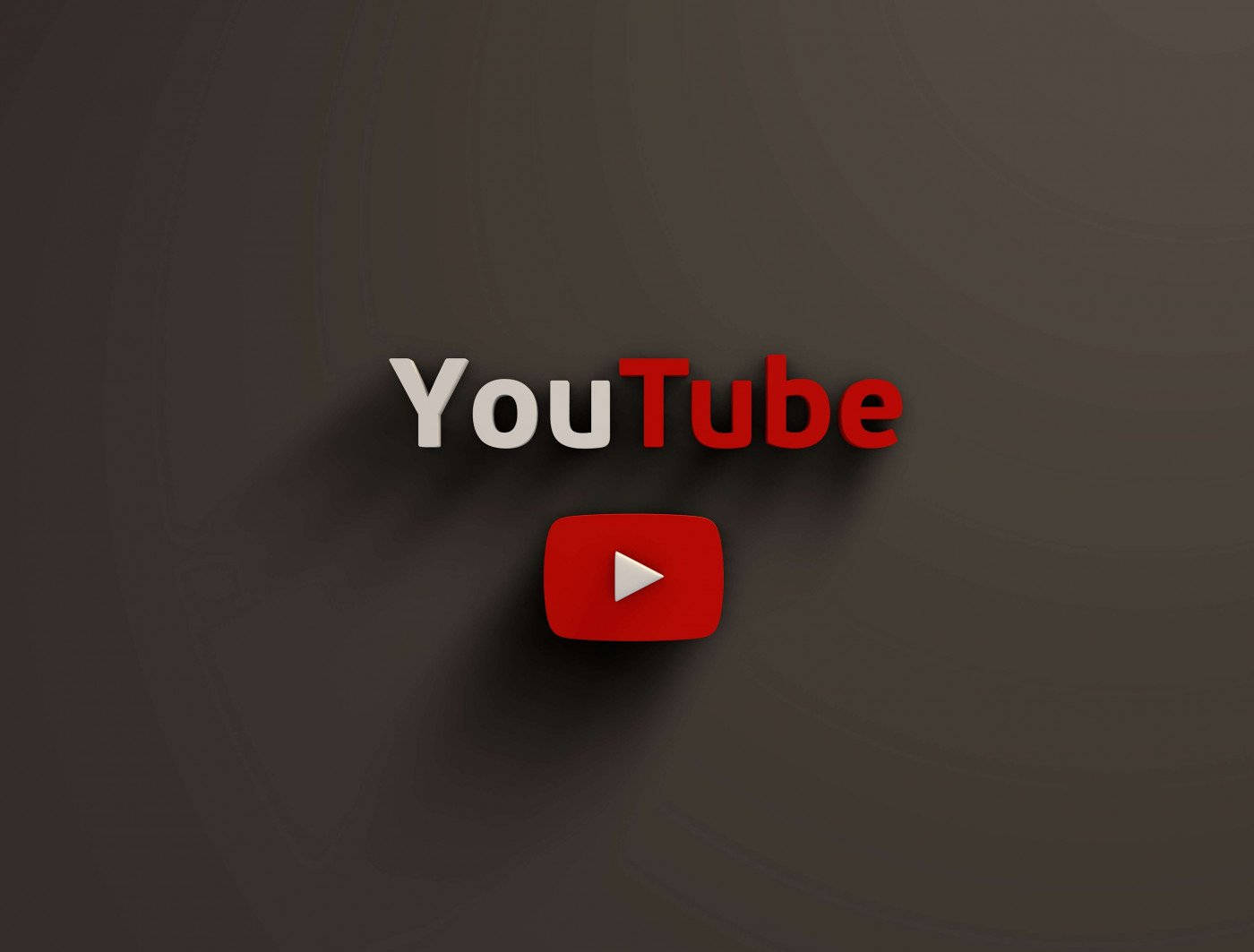 3D 桌布 壁紙 — YouTube 標誌，紅色播放按鈕居中，置於帶有柔和陰影的深灰色紋理背景上。