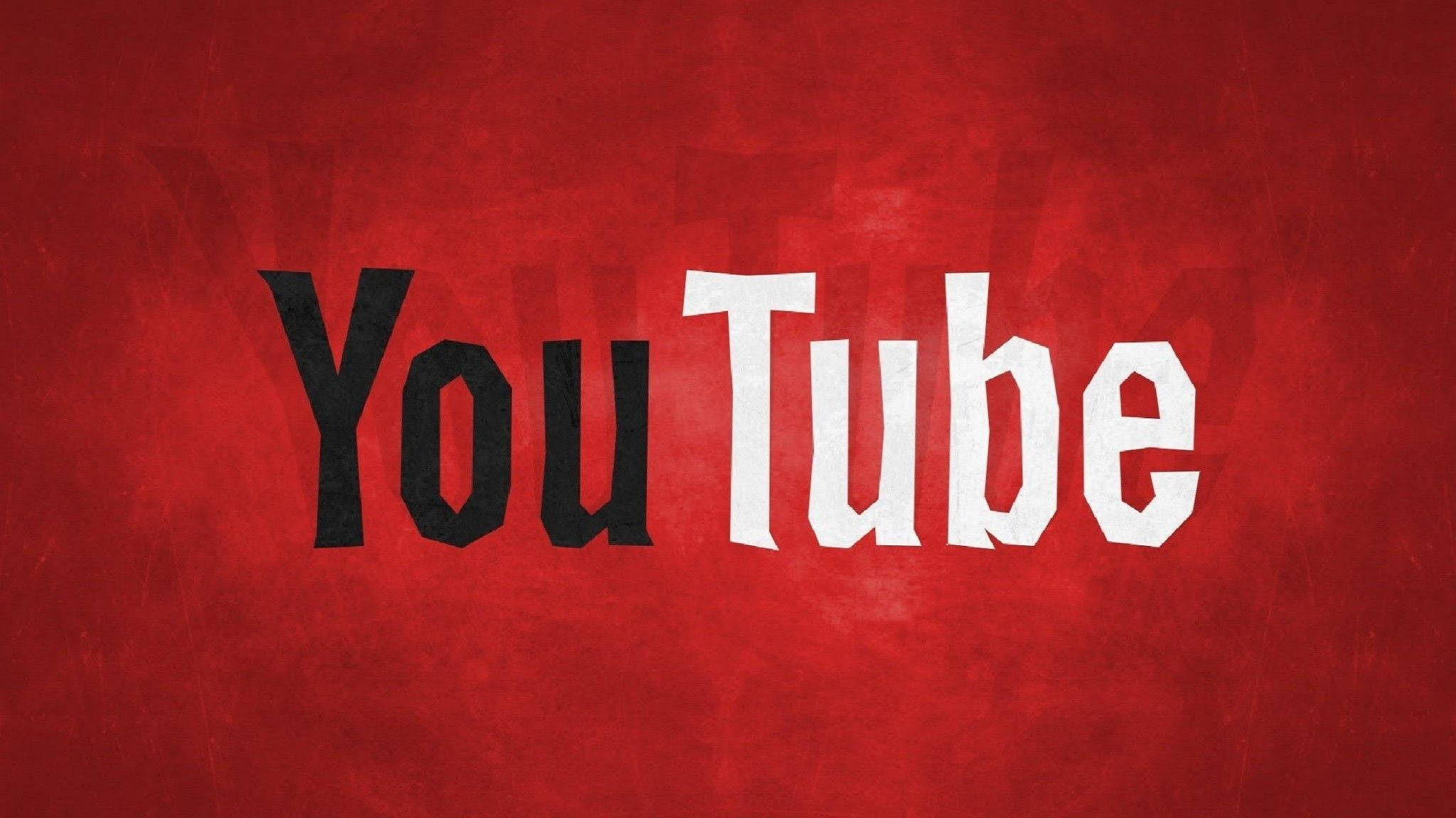 YouTube 桌布 壁紙 — YouTube 標誌以粗體黑白字體居中於有紋理的深紅色背景上。