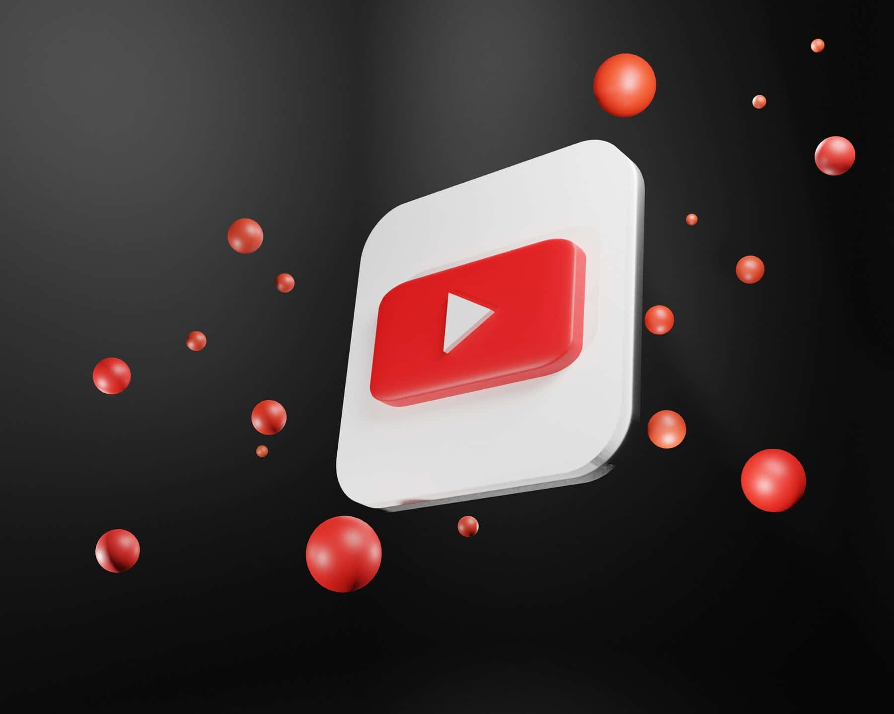 YouTube 標誌搭配紅色球體飛繞 壁紙