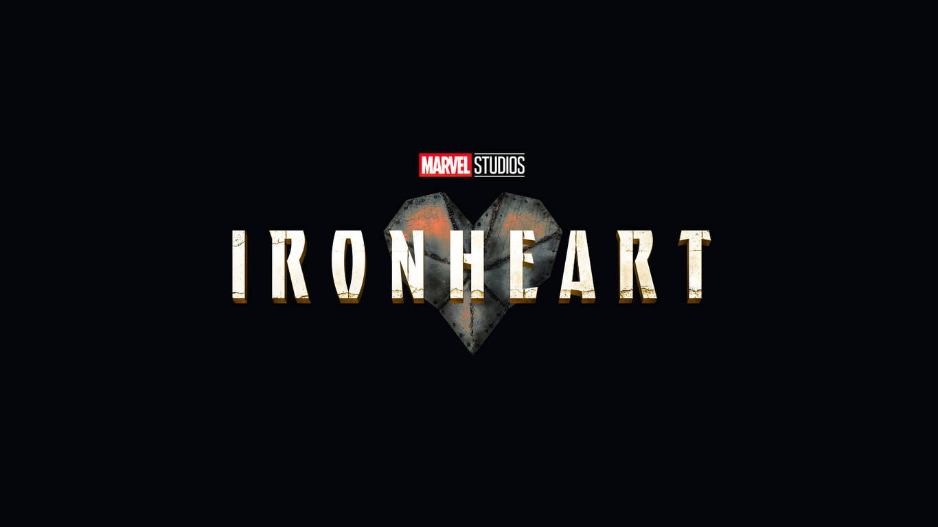 黑色背景上帶有心形盾牌徽章的Ironheart標題標誌。 — 1366X768 壁紙
